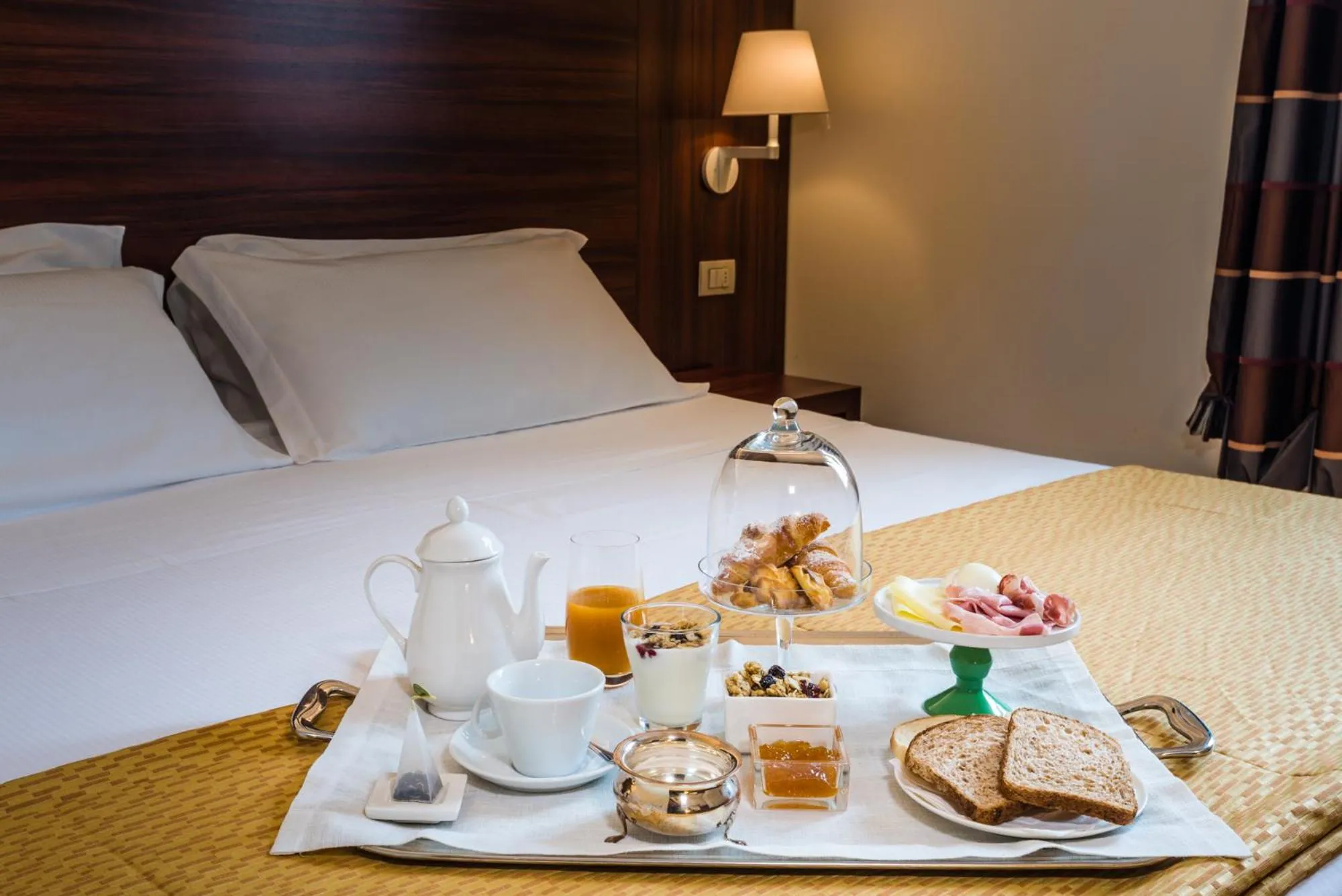 Bed in Delfina Palace Hotel