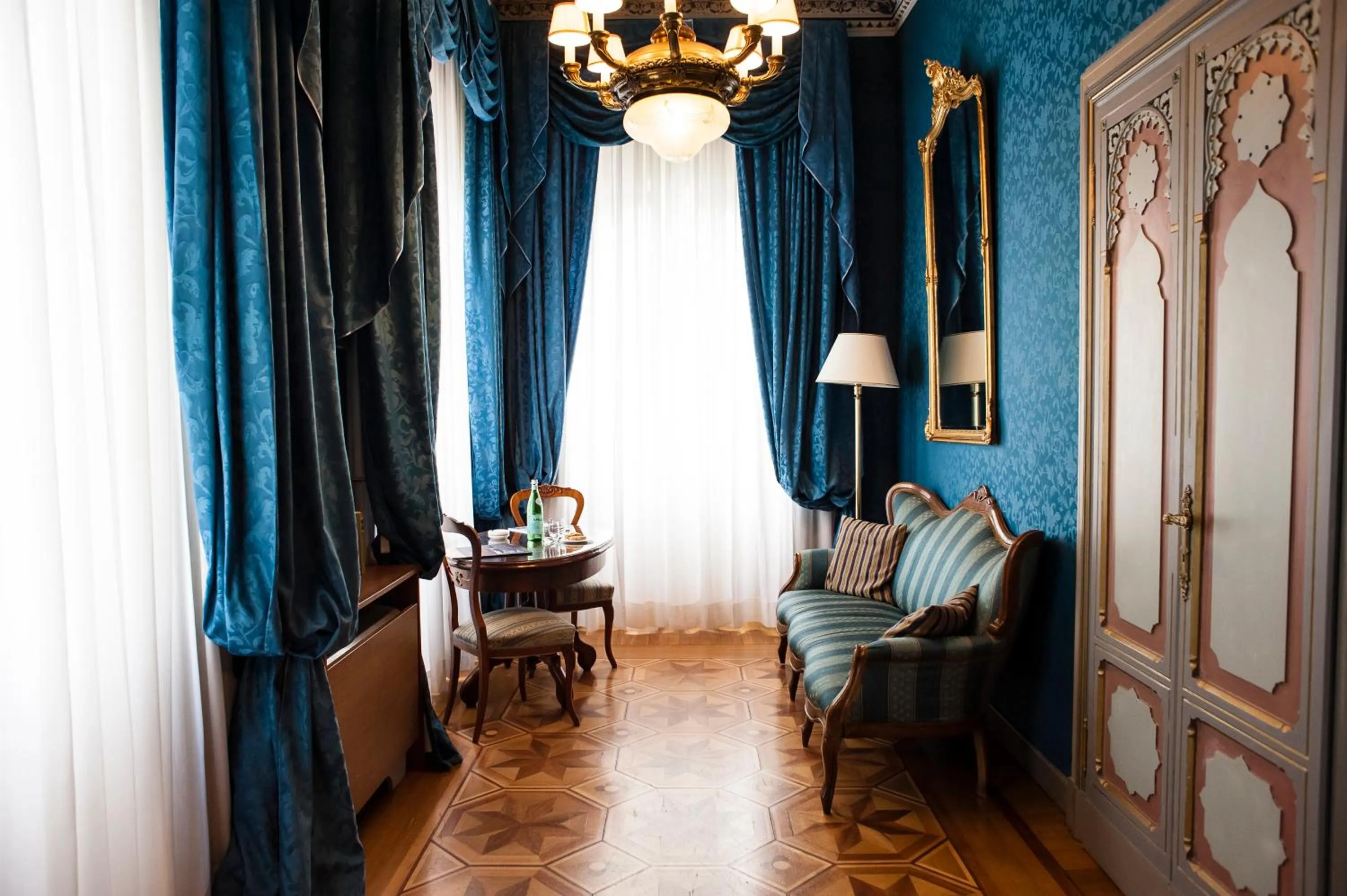 Seating area in Relais & Chateaux Villa Crespi