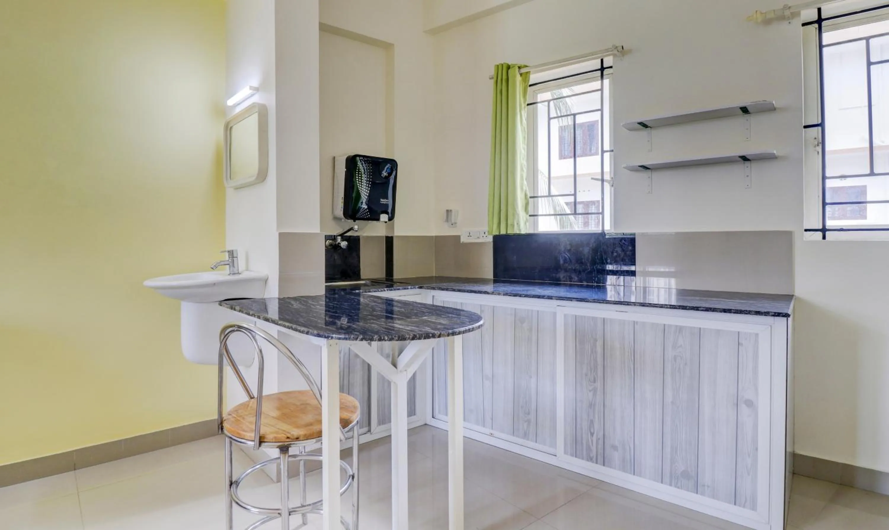 Kitchen or kitchenette in Itsy Hotels Ushodaya Royal Residency
