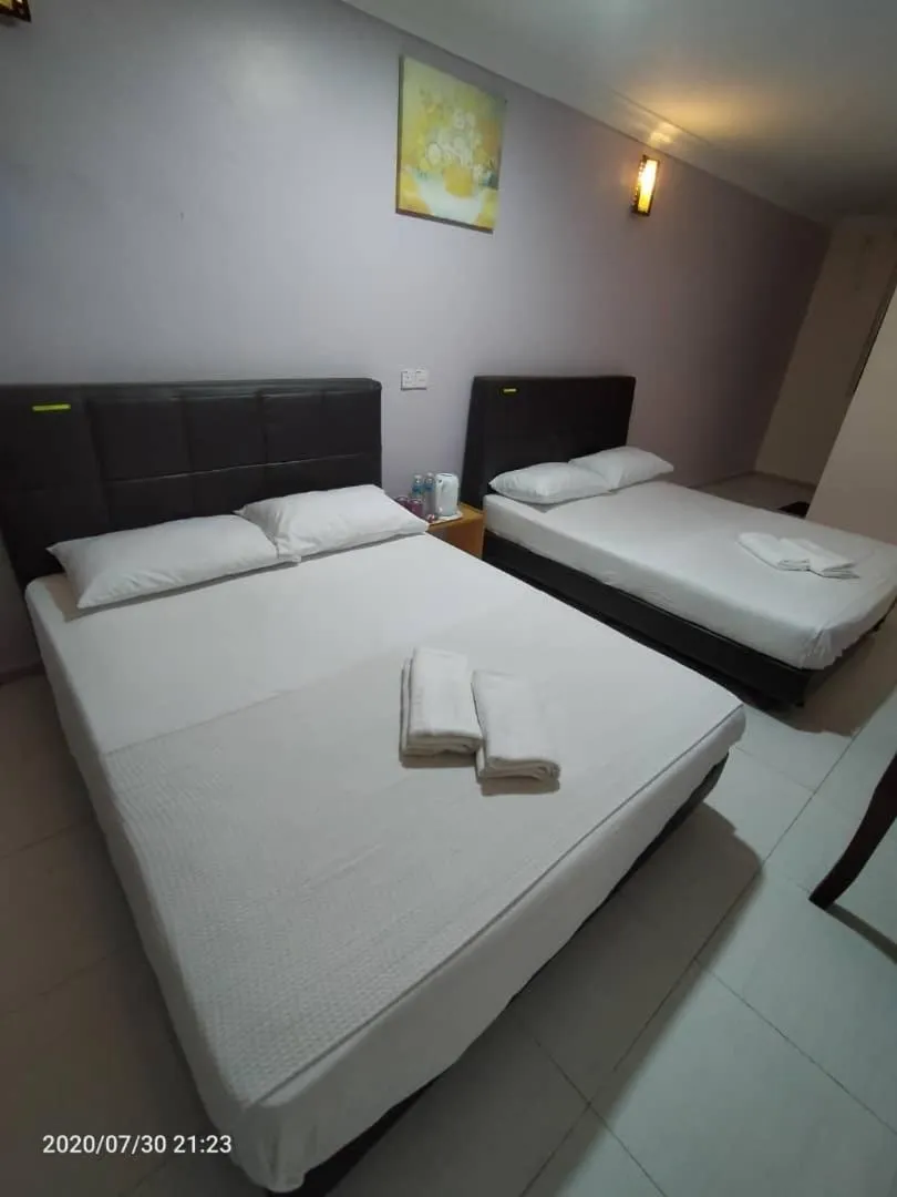 Photo of the whole room, Bed in TAMIM SUITE GROUP HOTEL Dungun