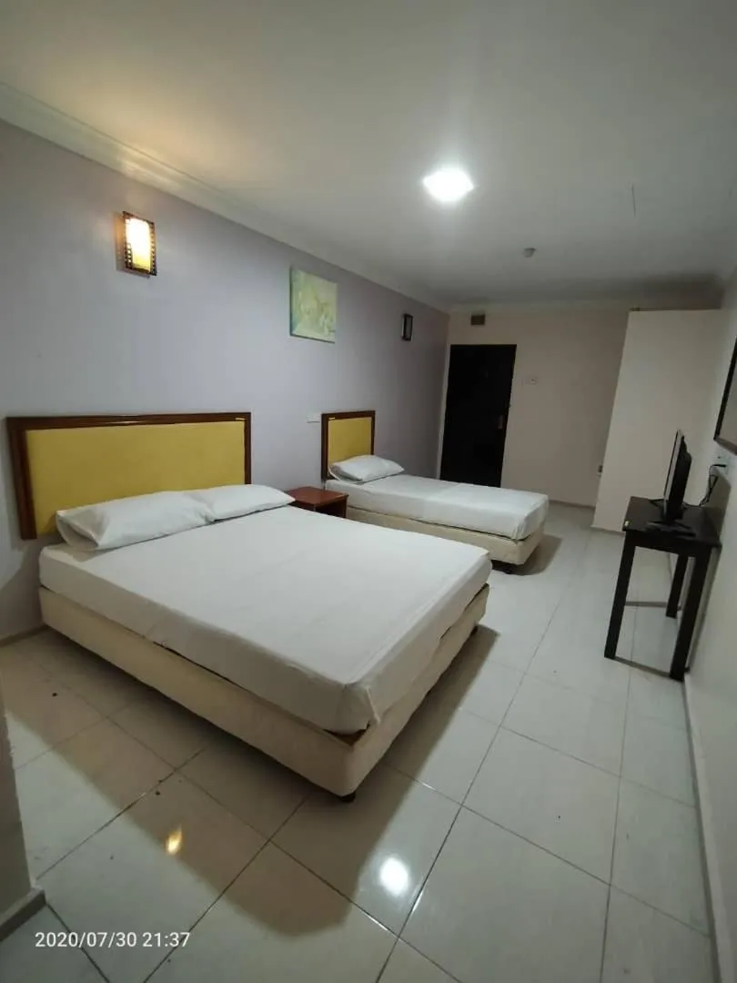 Bed in TAMIM SUITE GROUP HOTEL Dungun