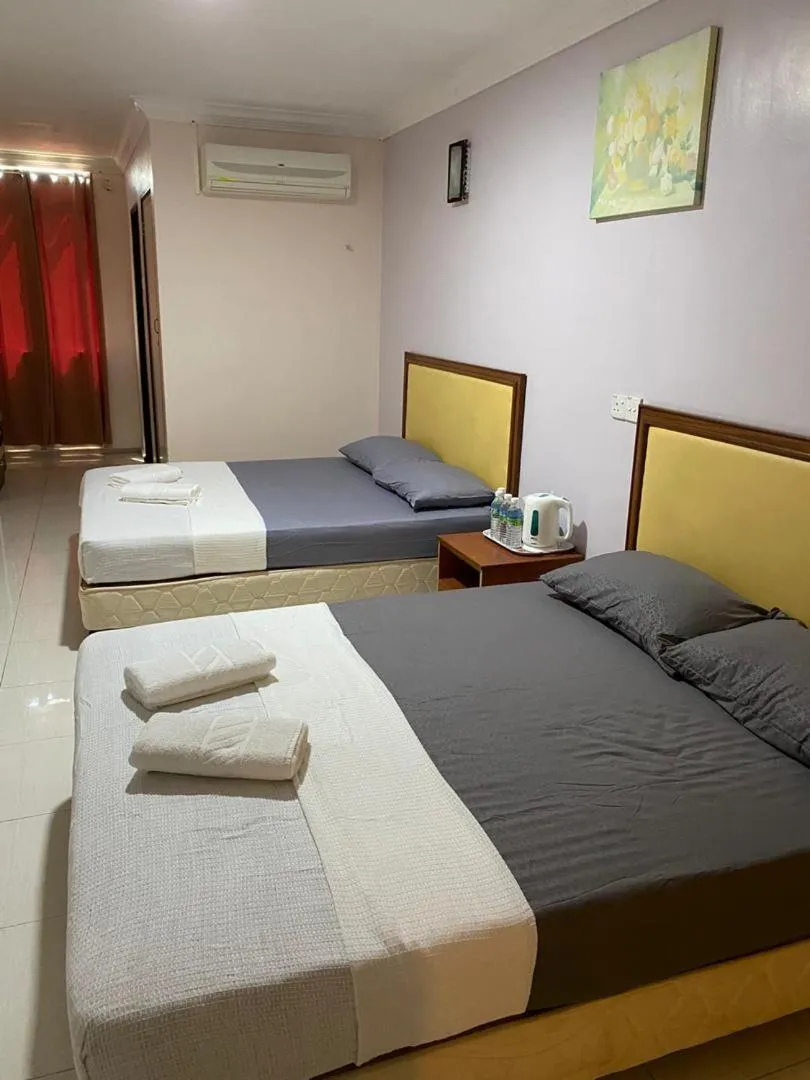 Bed in TAMIM SUITE GROUP HOTEL Dungun