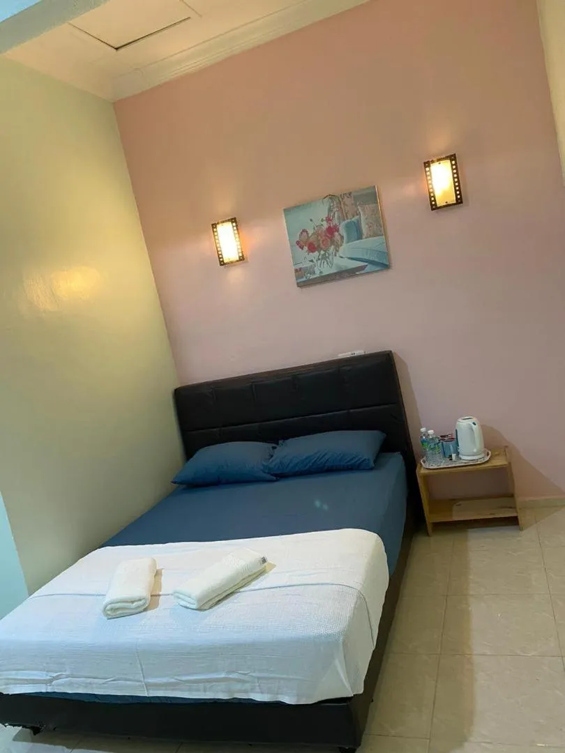 Bed in TAMIM SUITE GROUP HOTEL Dungun