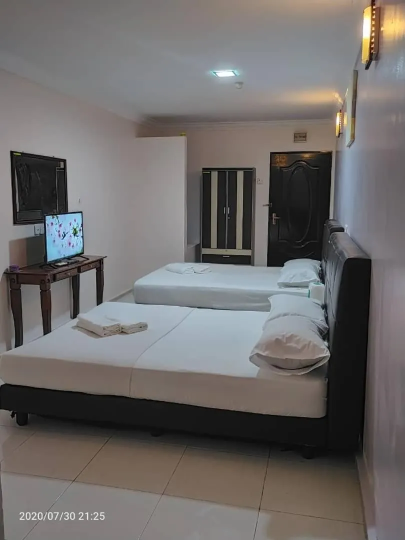 Bed in TAMIM SUITE GROUP HOTEL Dungun