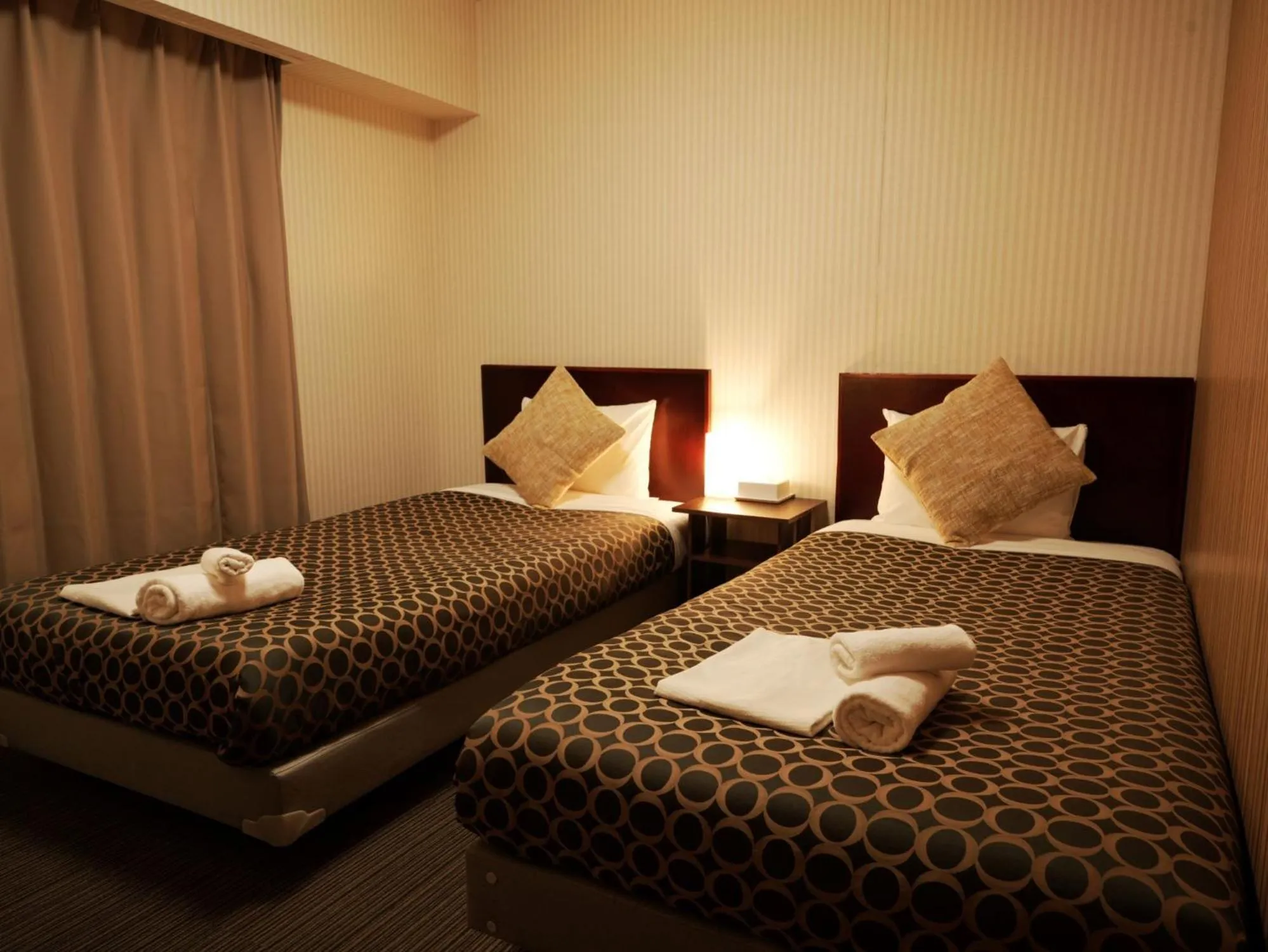 Bed in HOTEL THE GARDEN Ⅵ ICHINOMIYA