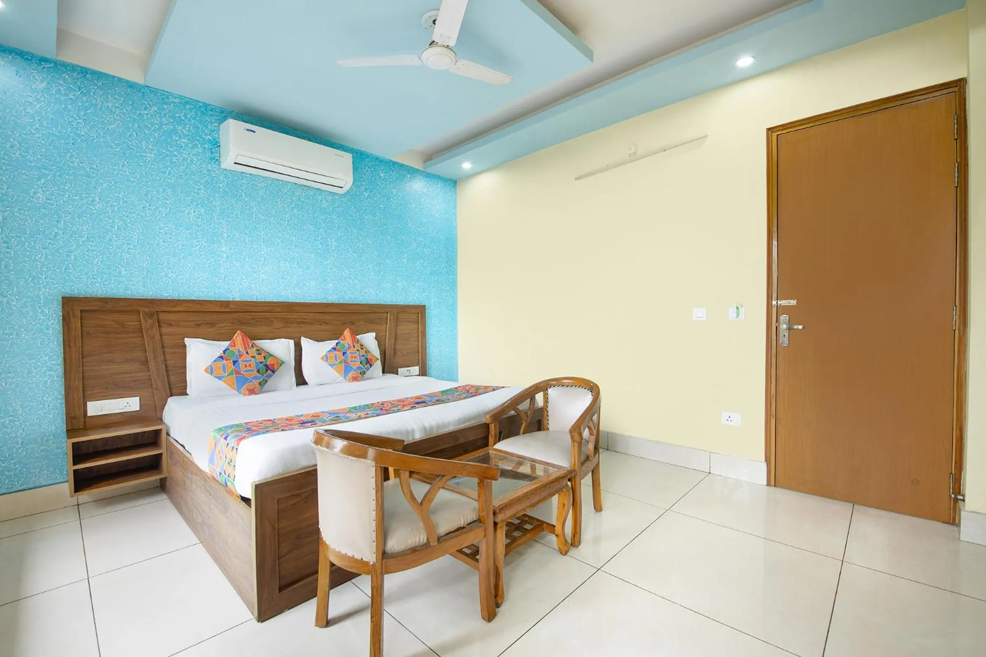 Bed in FabHotel Crestwood Inn