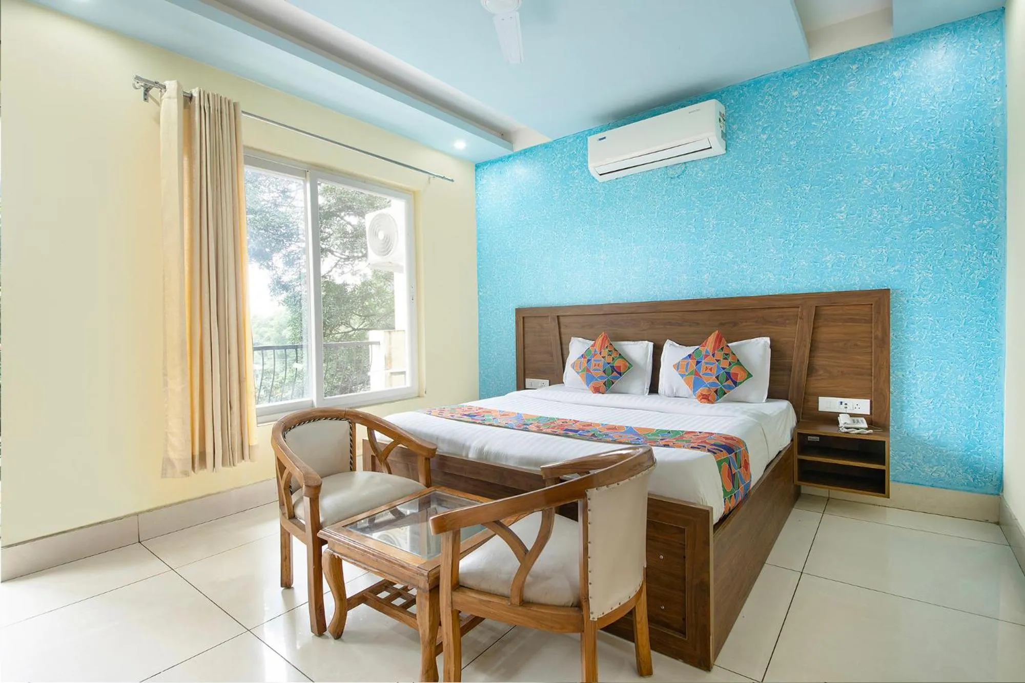 Bed in FabHotel Crestwood Inn