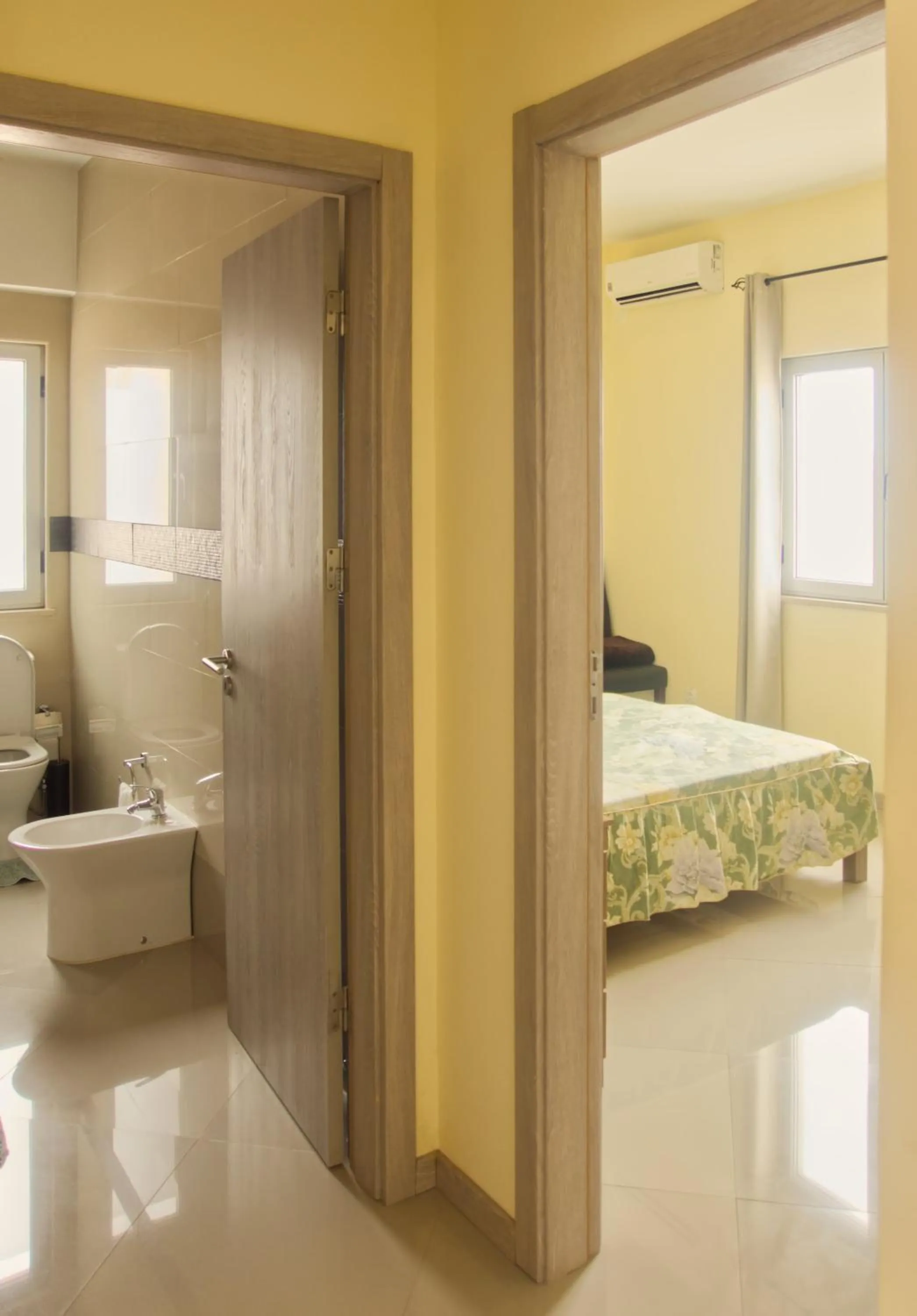 Bathroom, Bed in Praia Capital Residence Aparthotel