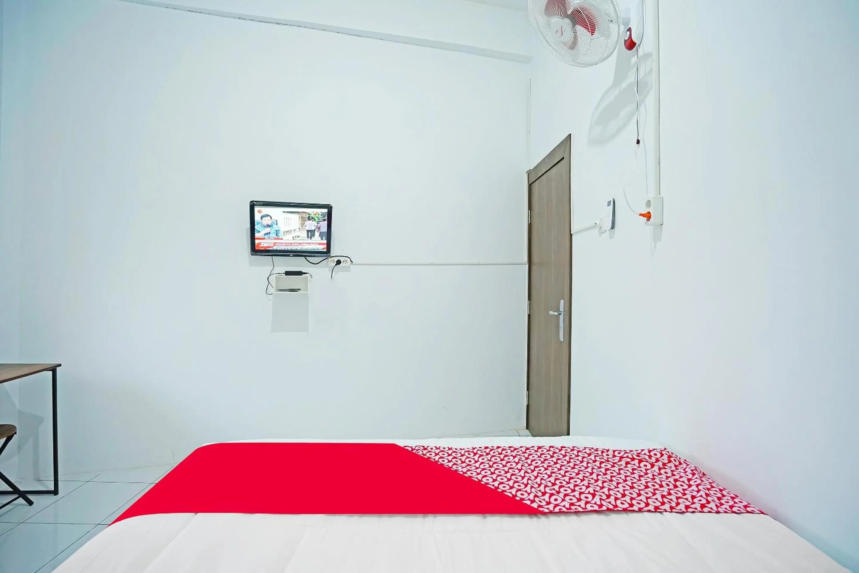 Bedroom in Hotel O Kost Bangau Syariah