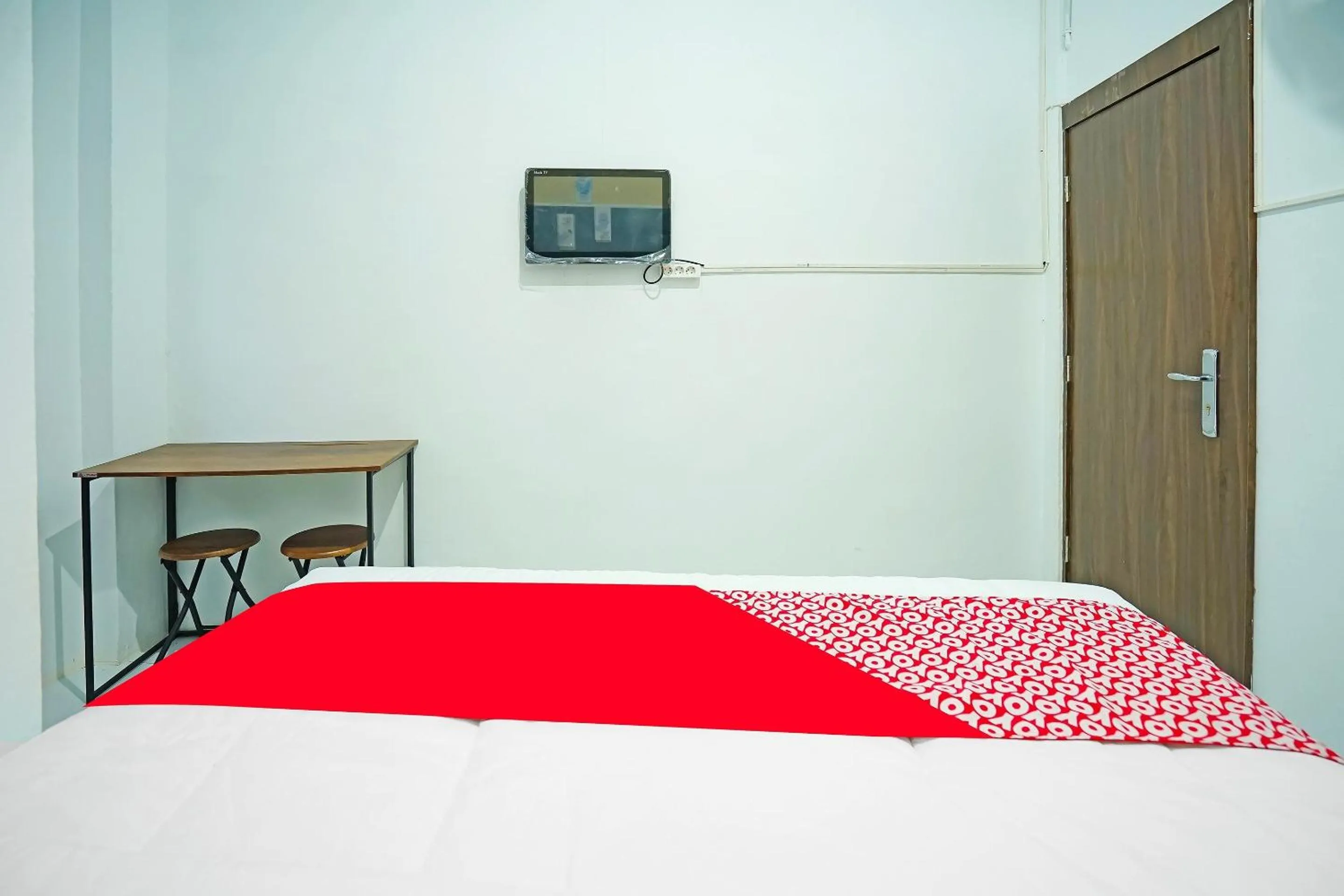 Bedroom in Hotel O Kost Bangau Syariah