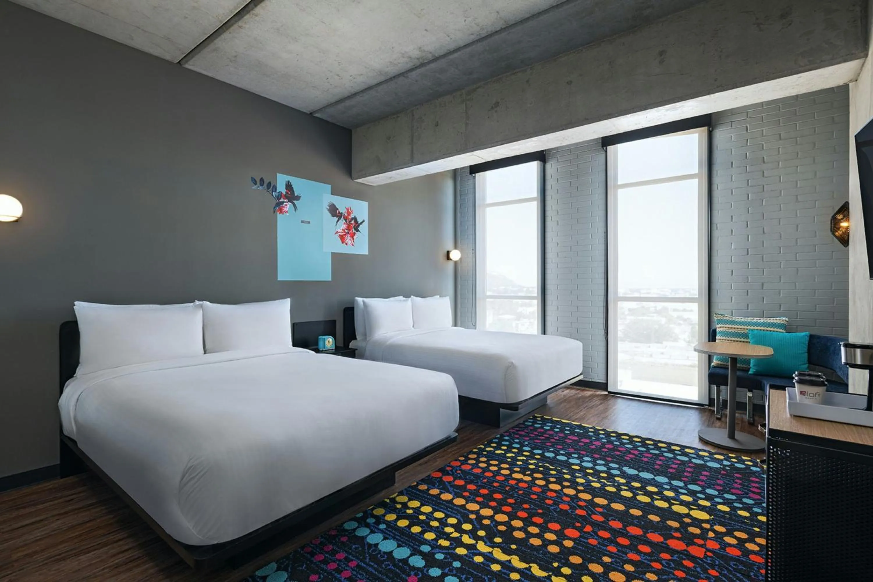 Photo of the whole room, Bed in Aloft Guadalajara Sur