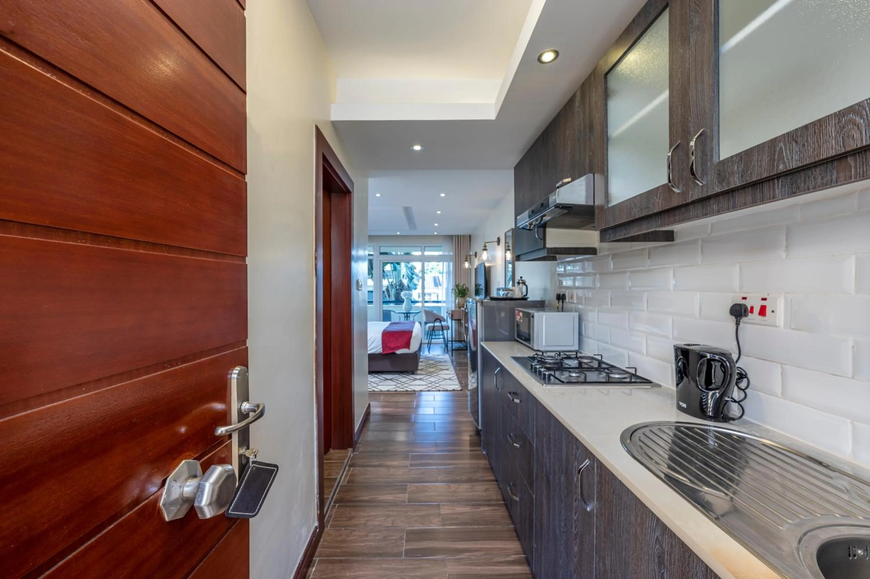 Kitchen or kitchenette in Roma Court Serviced Apartments