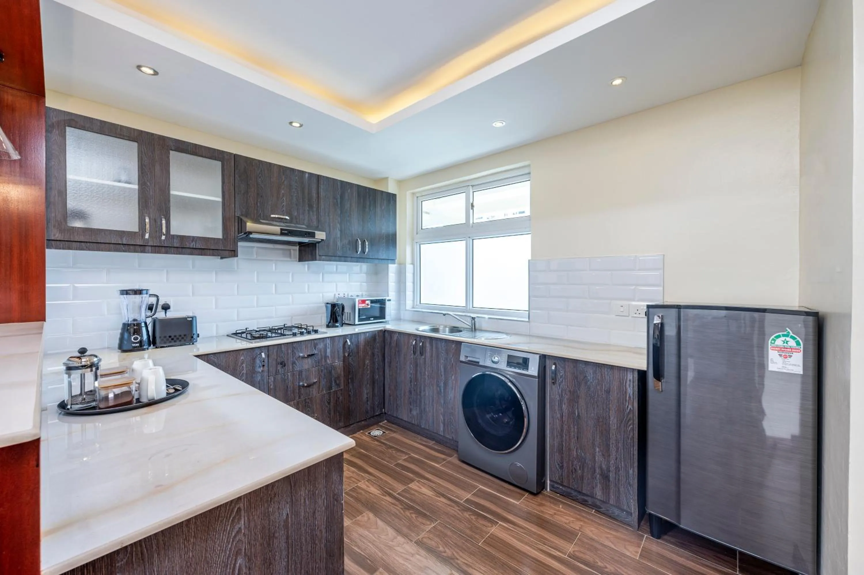 Kitchen or kitchenette in Roma Court Serviced Apartments