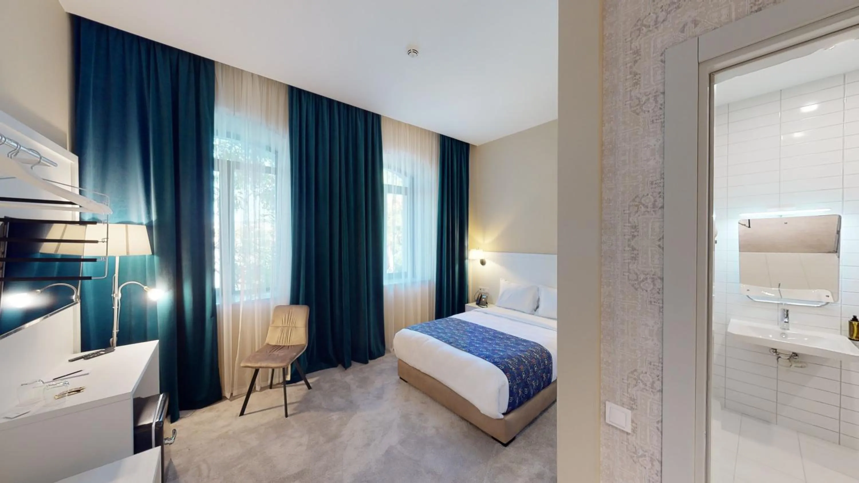 Photo of the whole room, Bed in EPIGRAPH Design Hotel