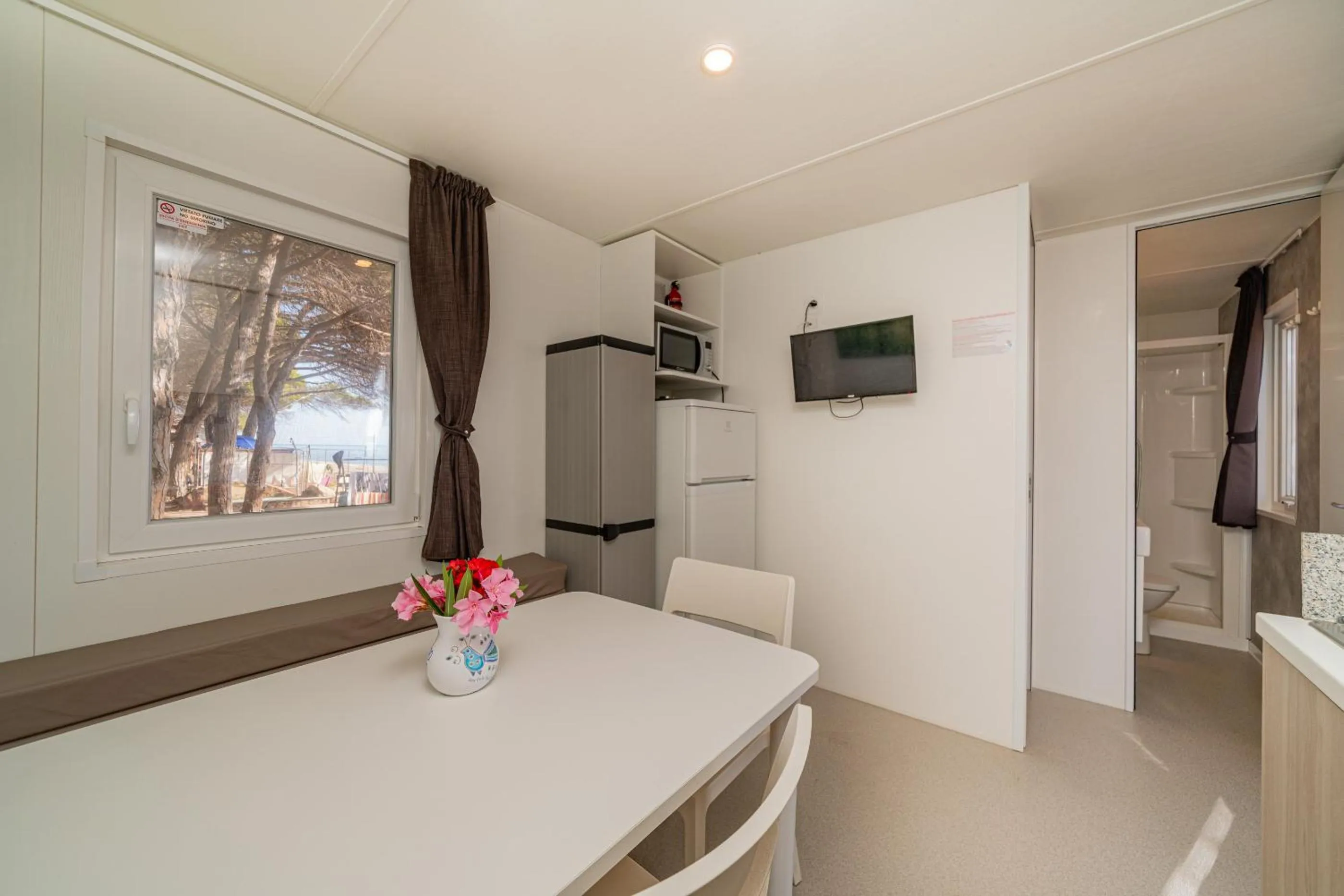 Communal lounge/ TV room in Camping&Village Le Cernie