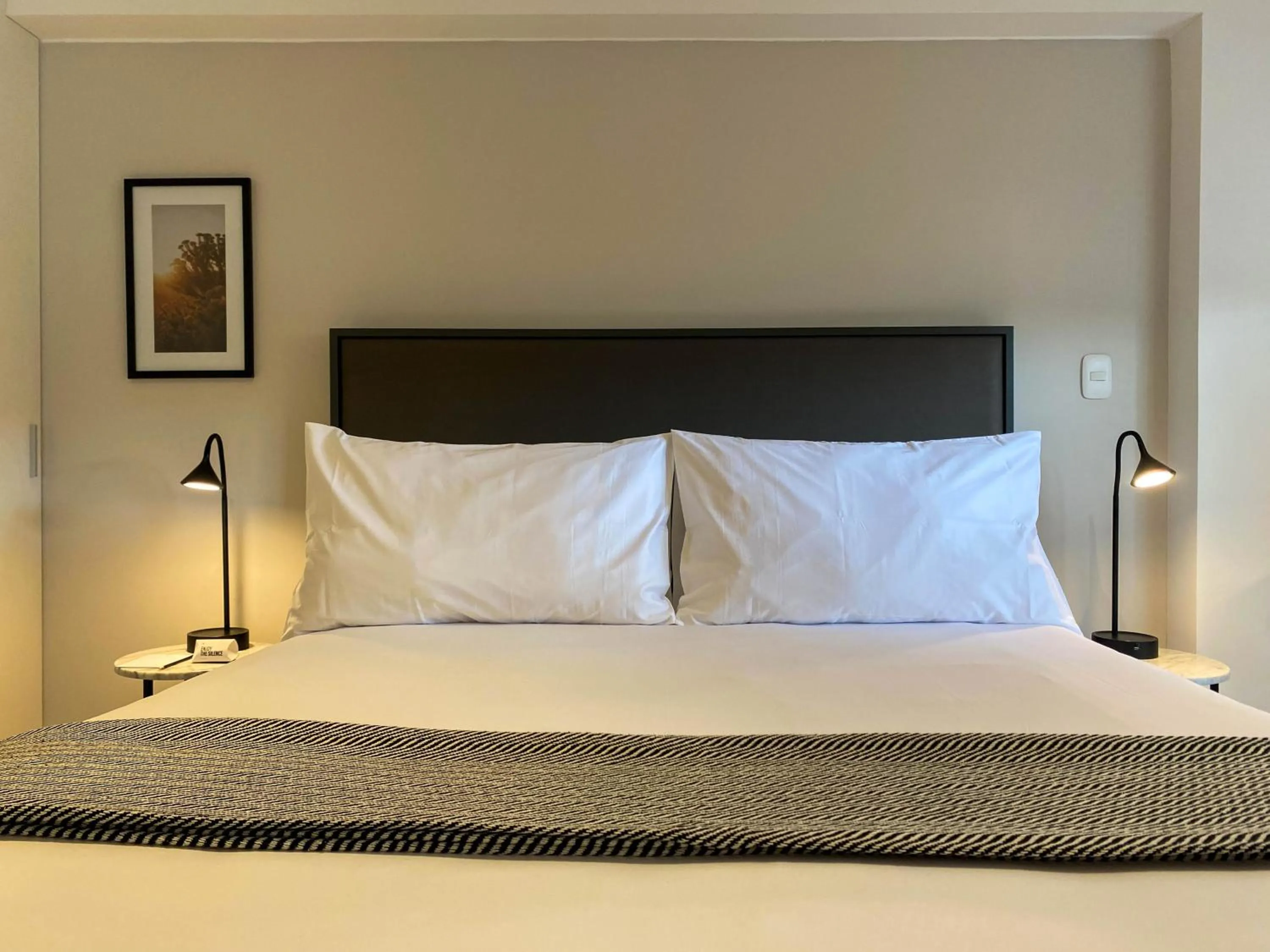 Bed in Monumental by Wynwood House