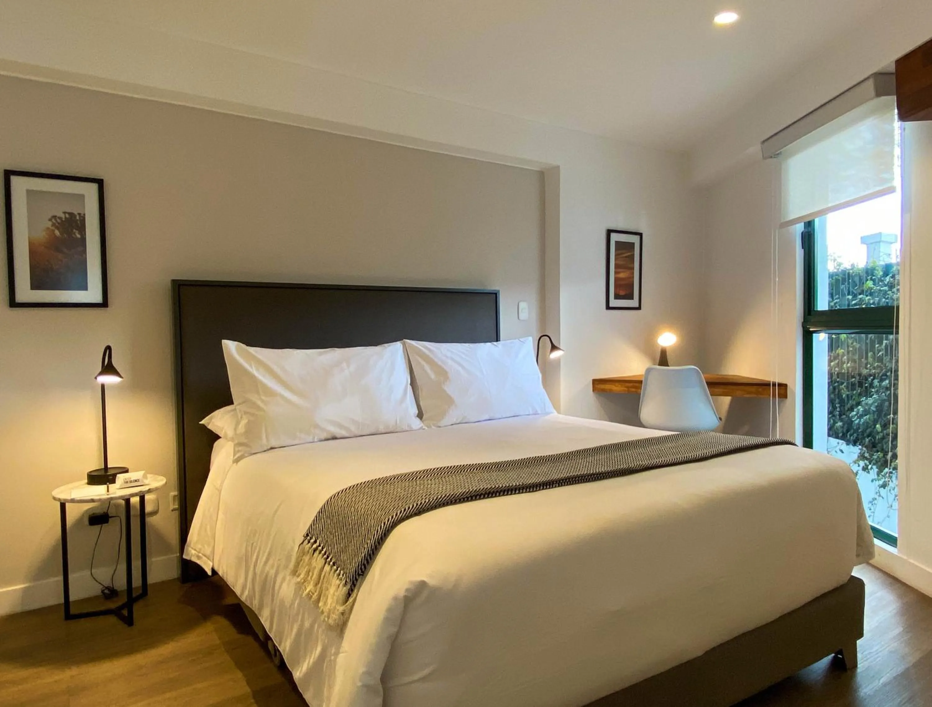 Bed in Monumental by Wynwood House