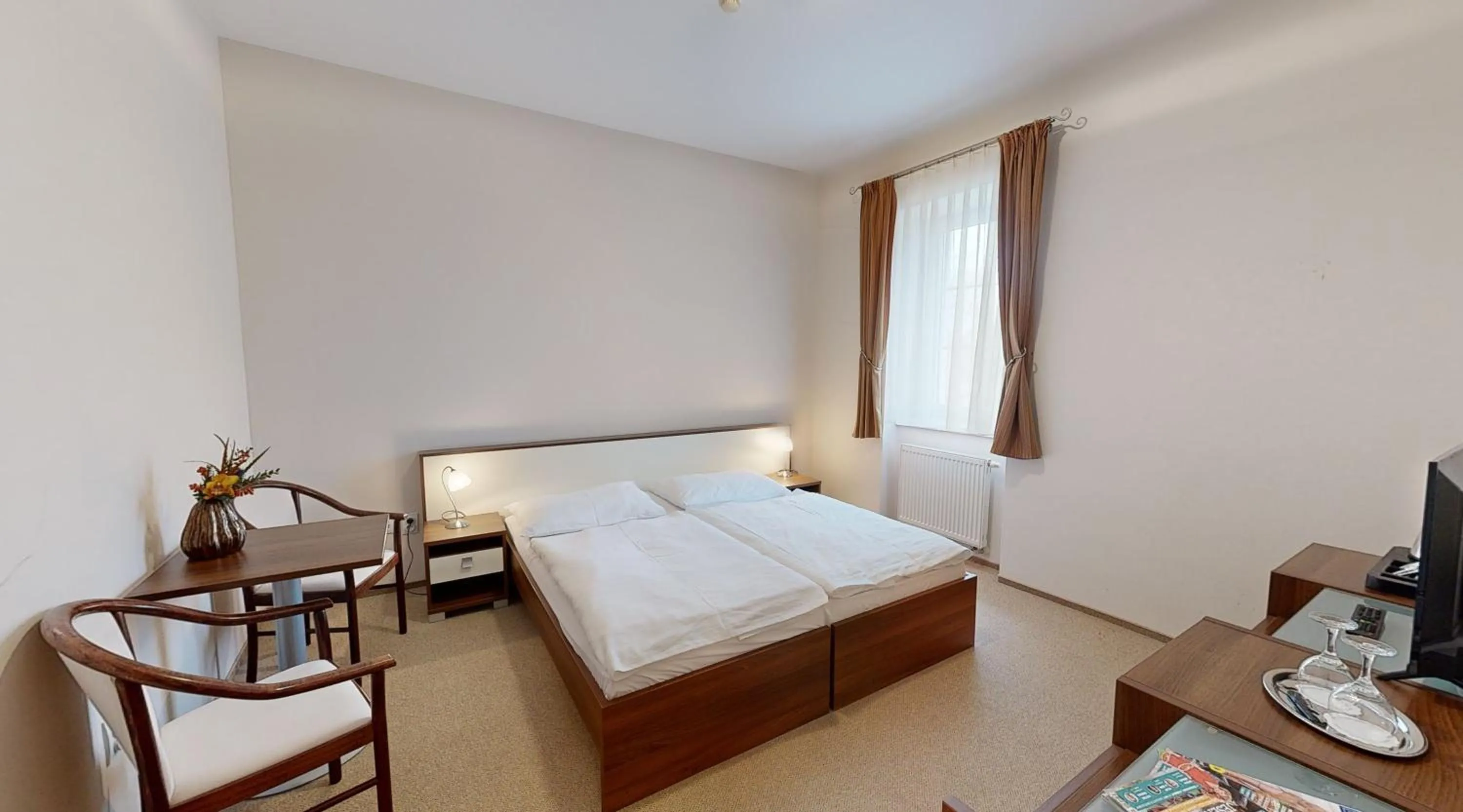 Bedroom in Apex Hotel