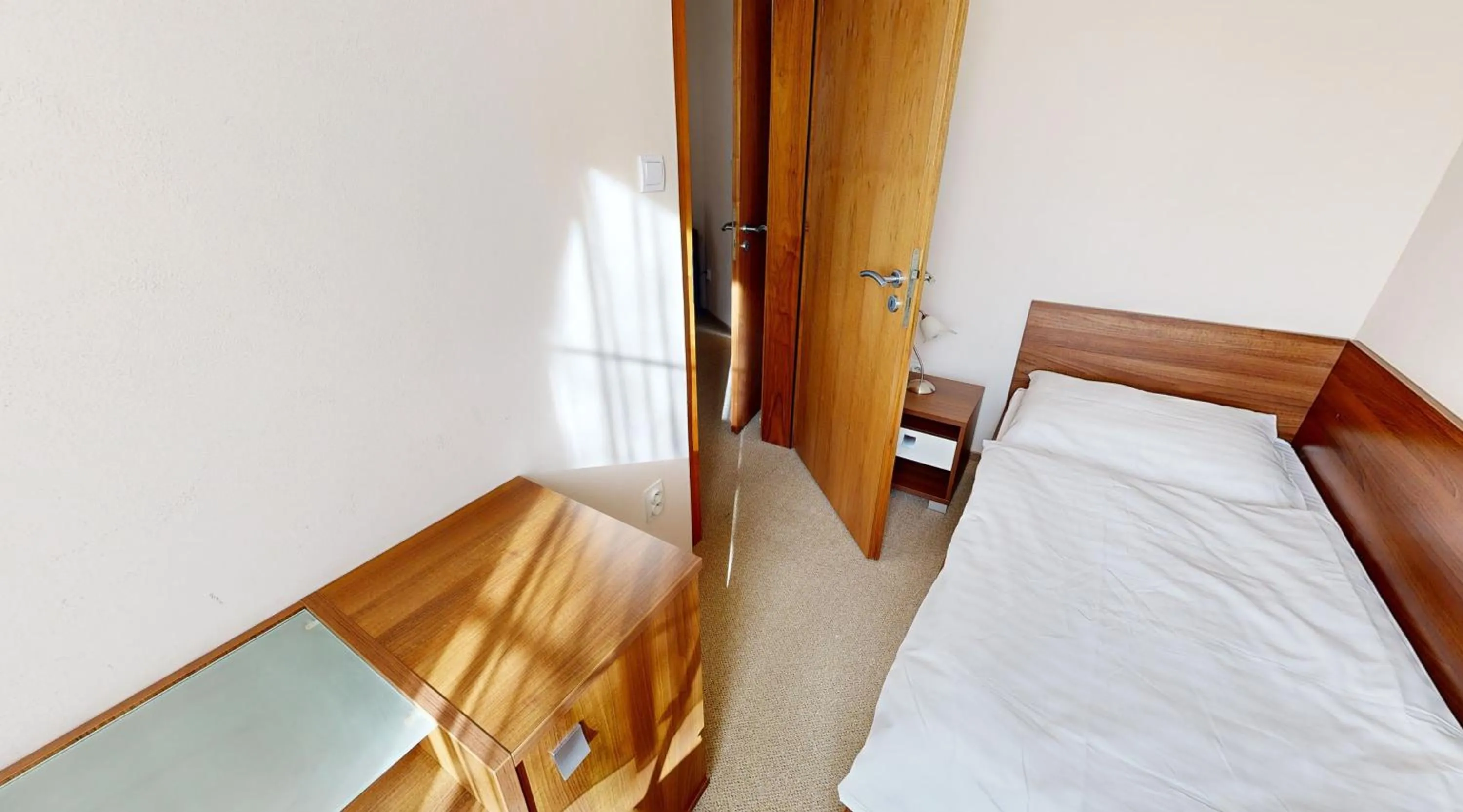 Bedroom in Apex Hotel