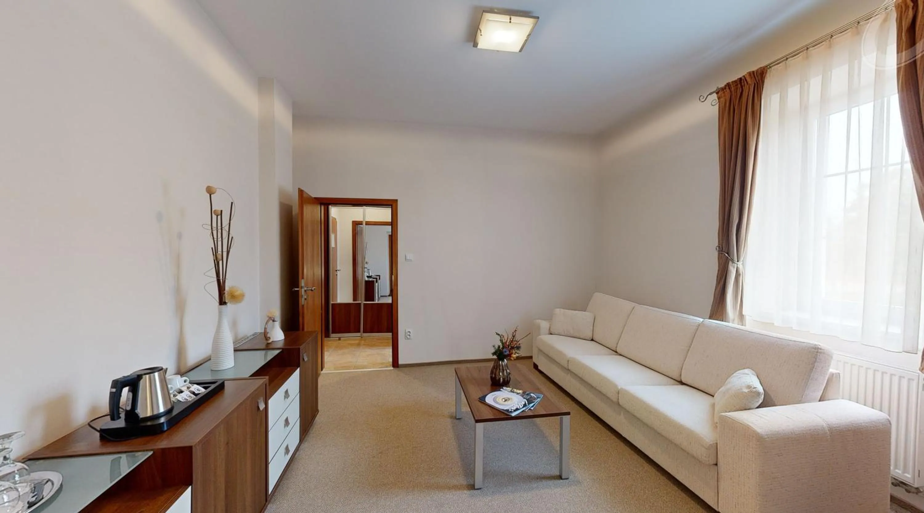 Living room in Apex Hotel