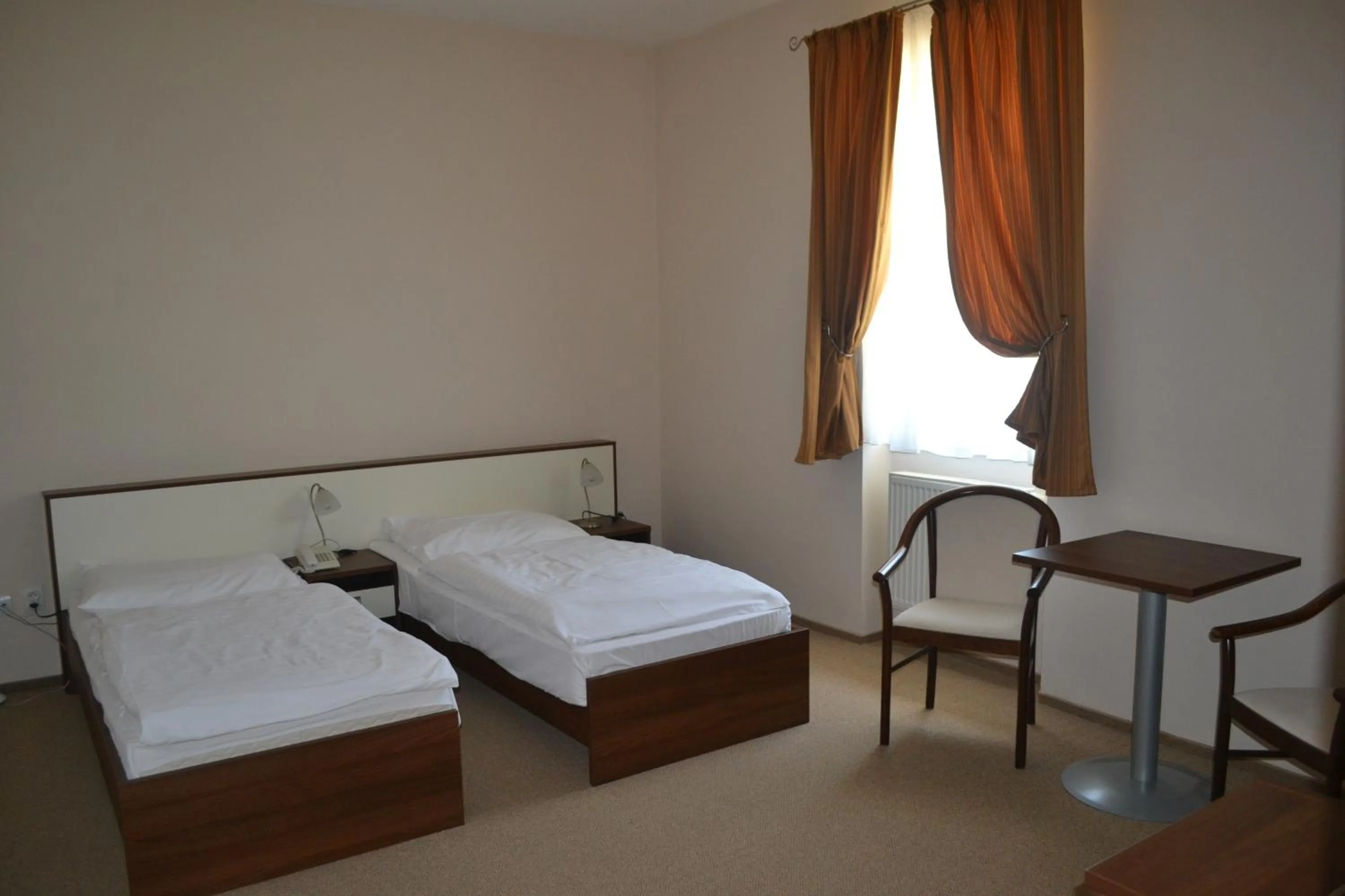 Bedroom in Apex Hotel