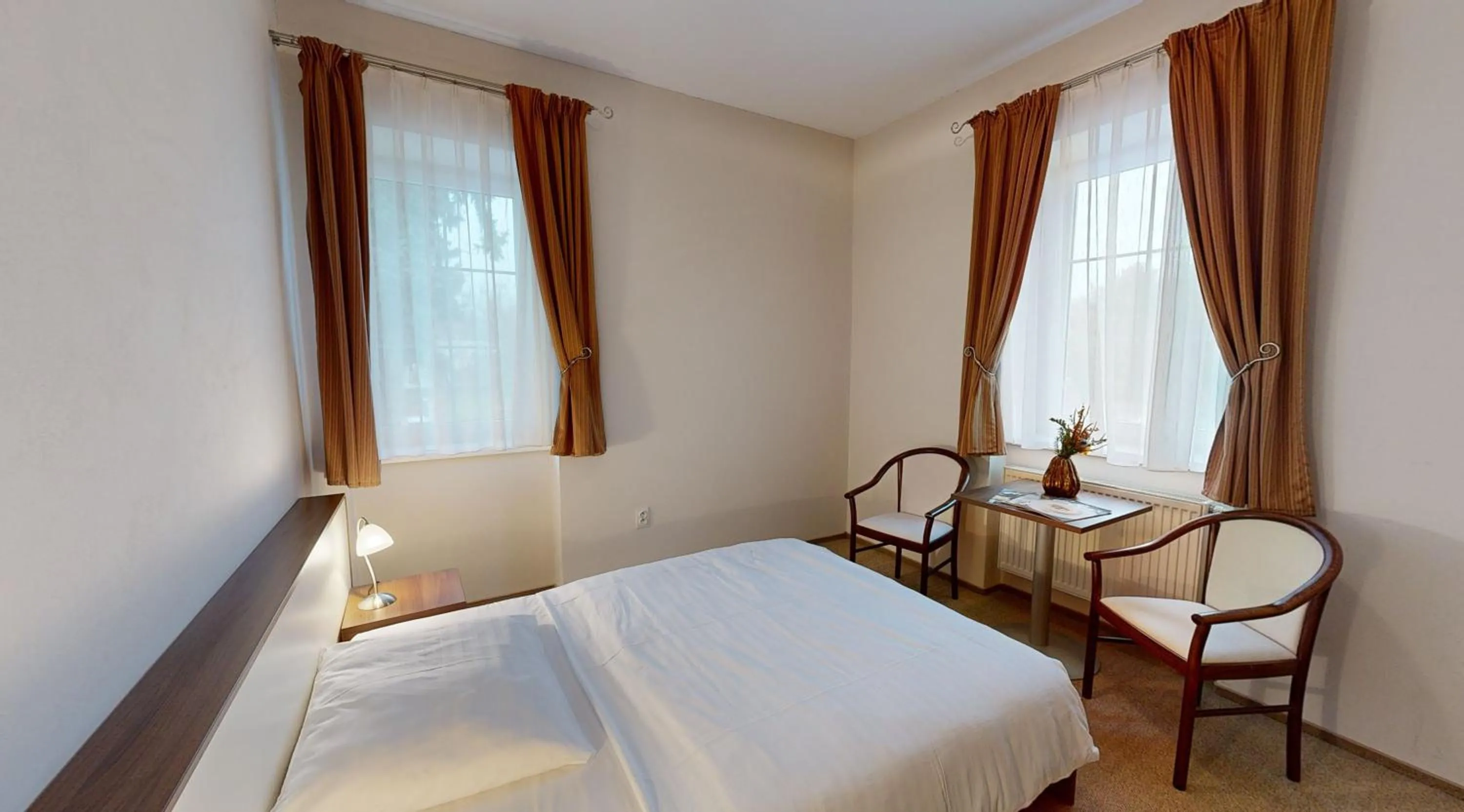 Bedroom in Apex Hotel