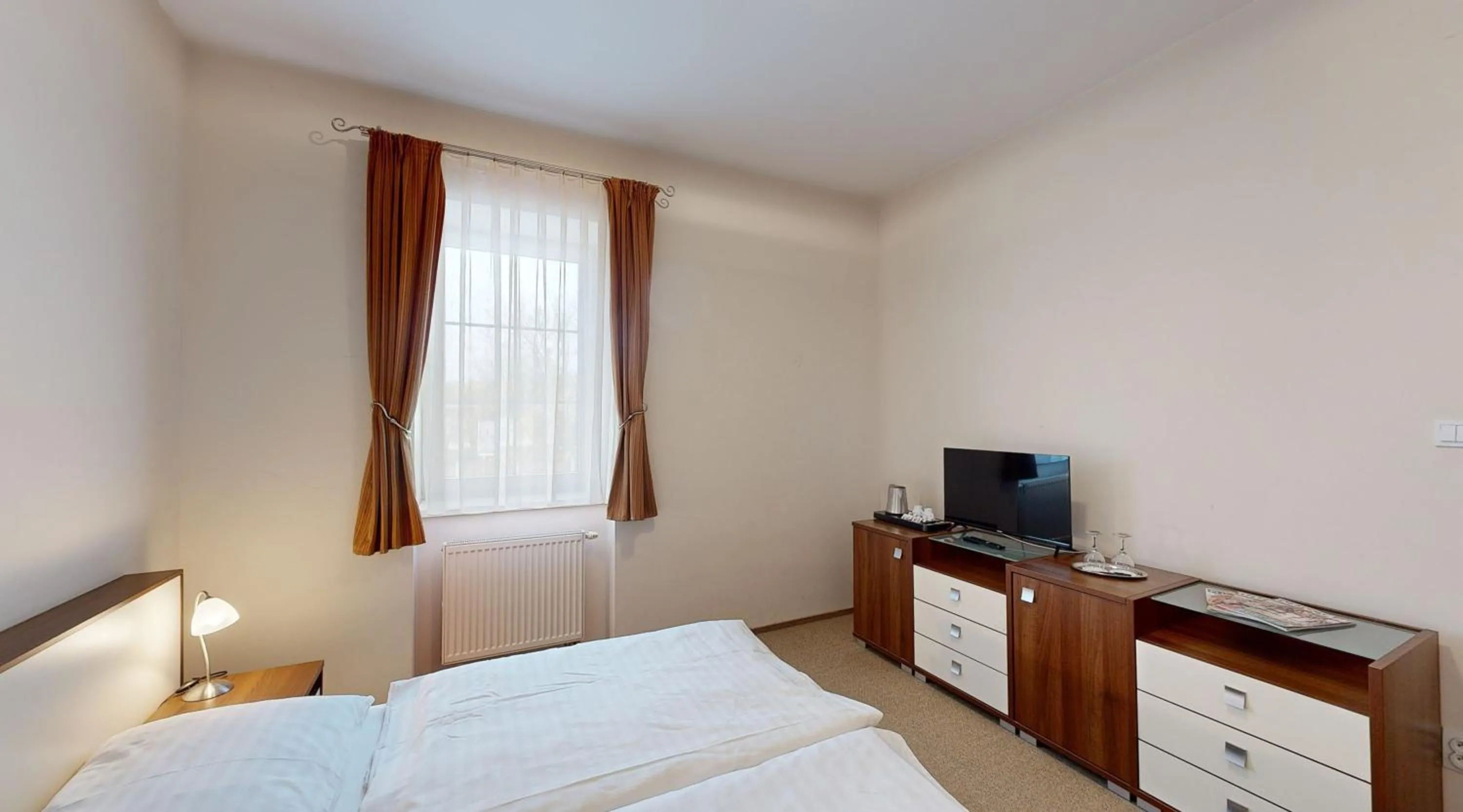 Bedroom in Apex Hotel