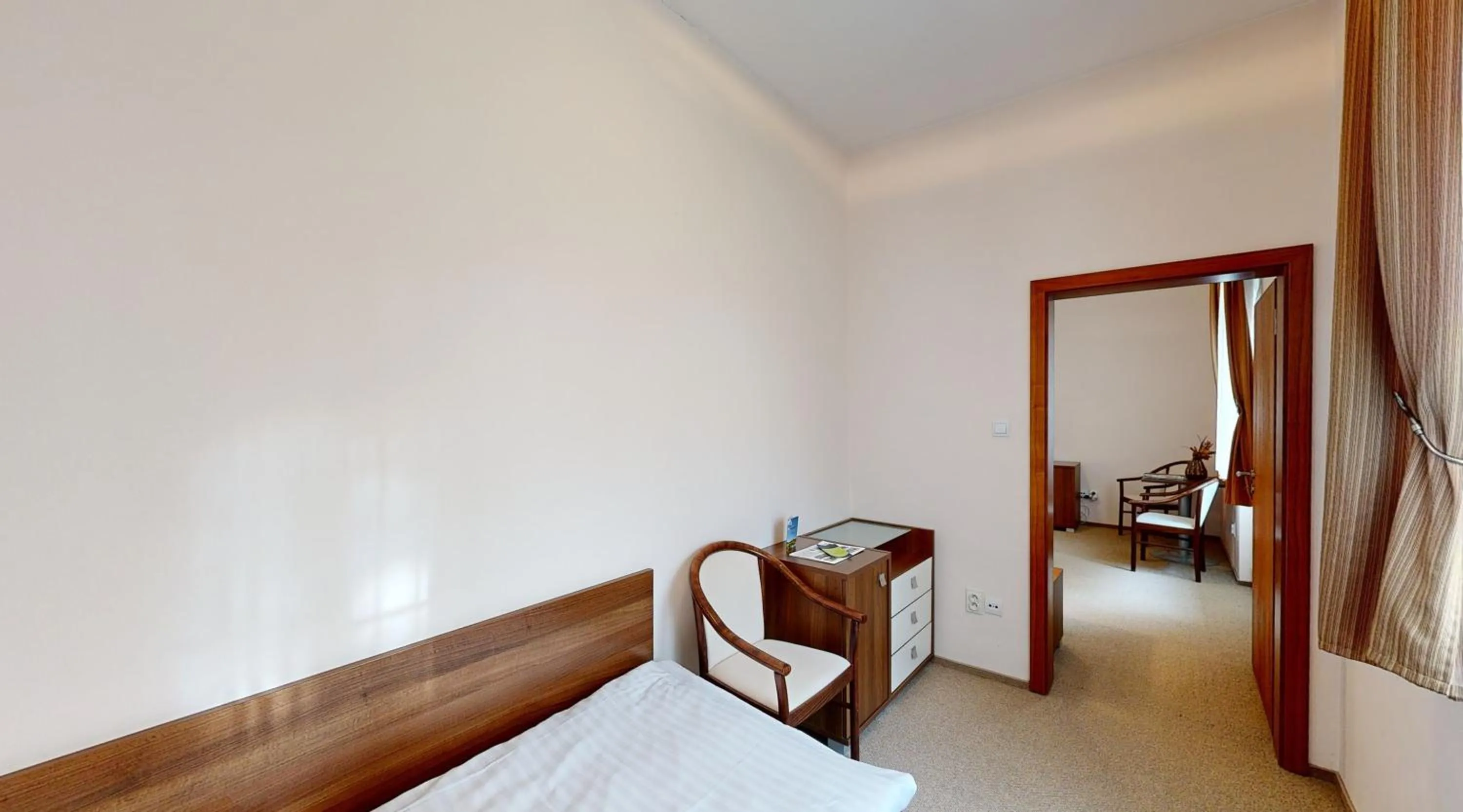 Bedroom in Apex Hotel