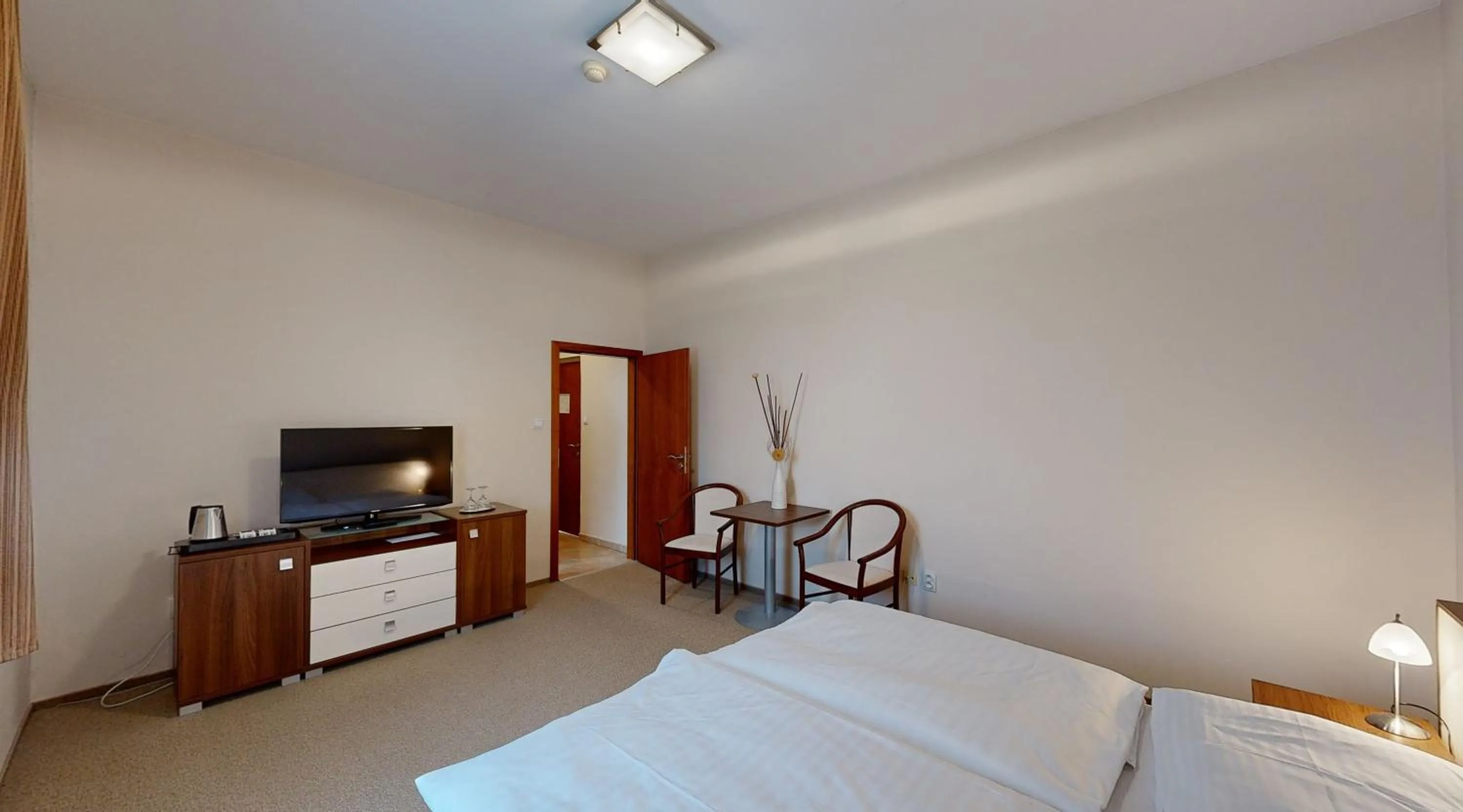 Bedroom in Apex Hotel