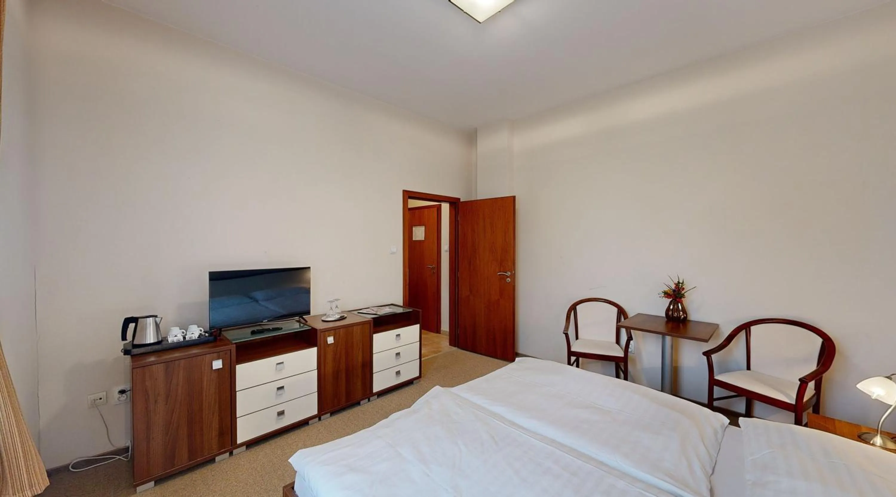 Bedroom in Apex Hotel