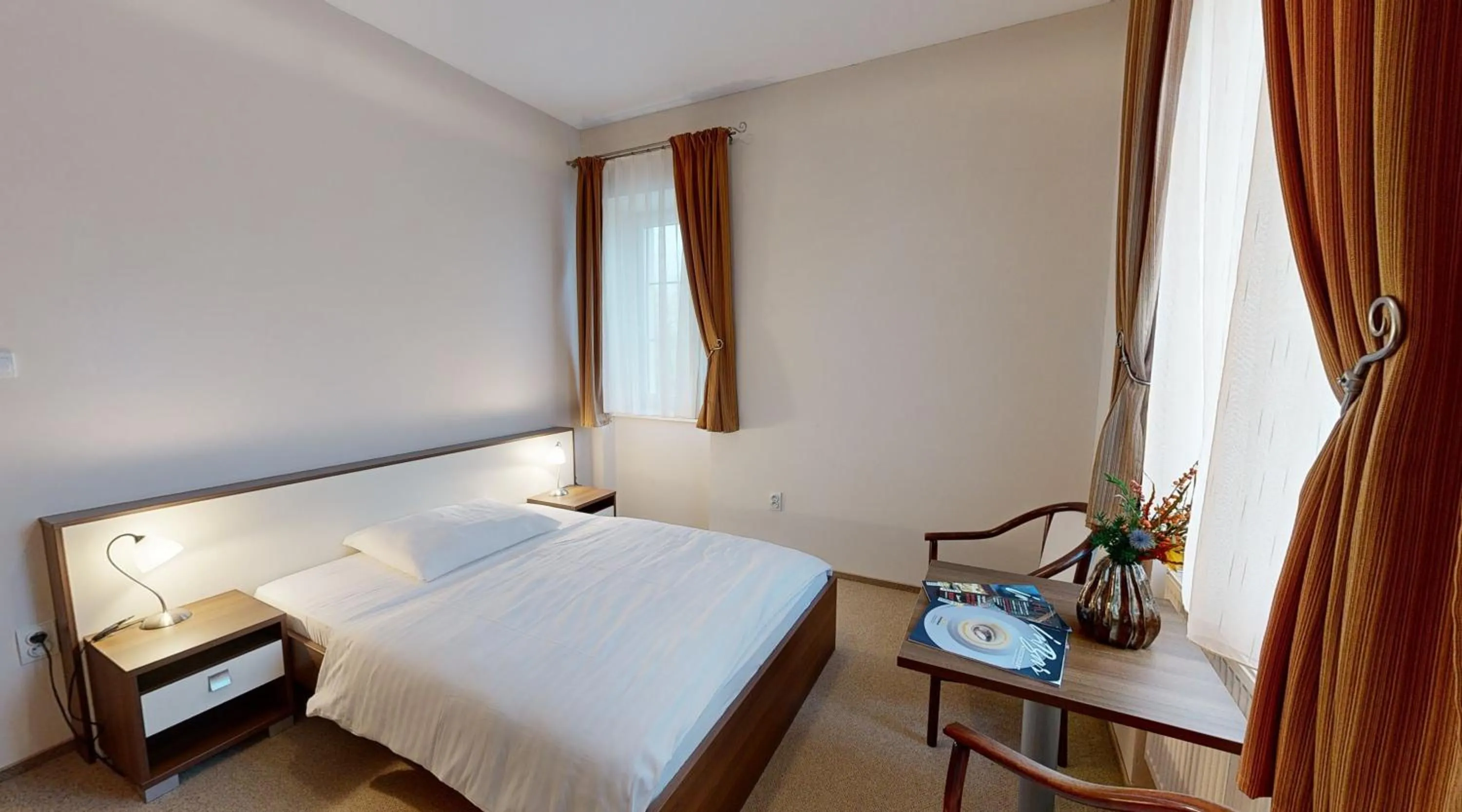 Bedroom in Apex Hotel