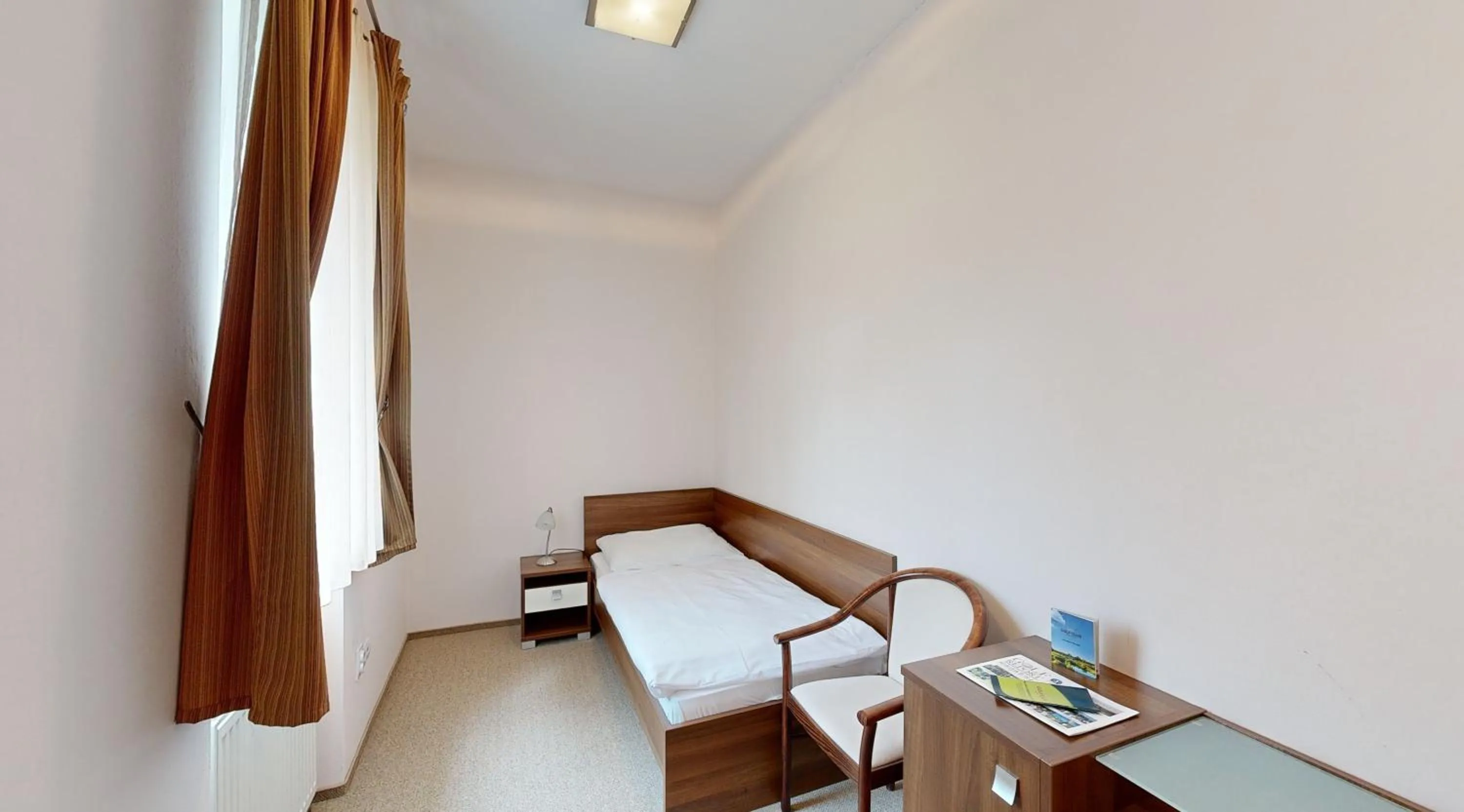 Bedroom in Apex Hotel