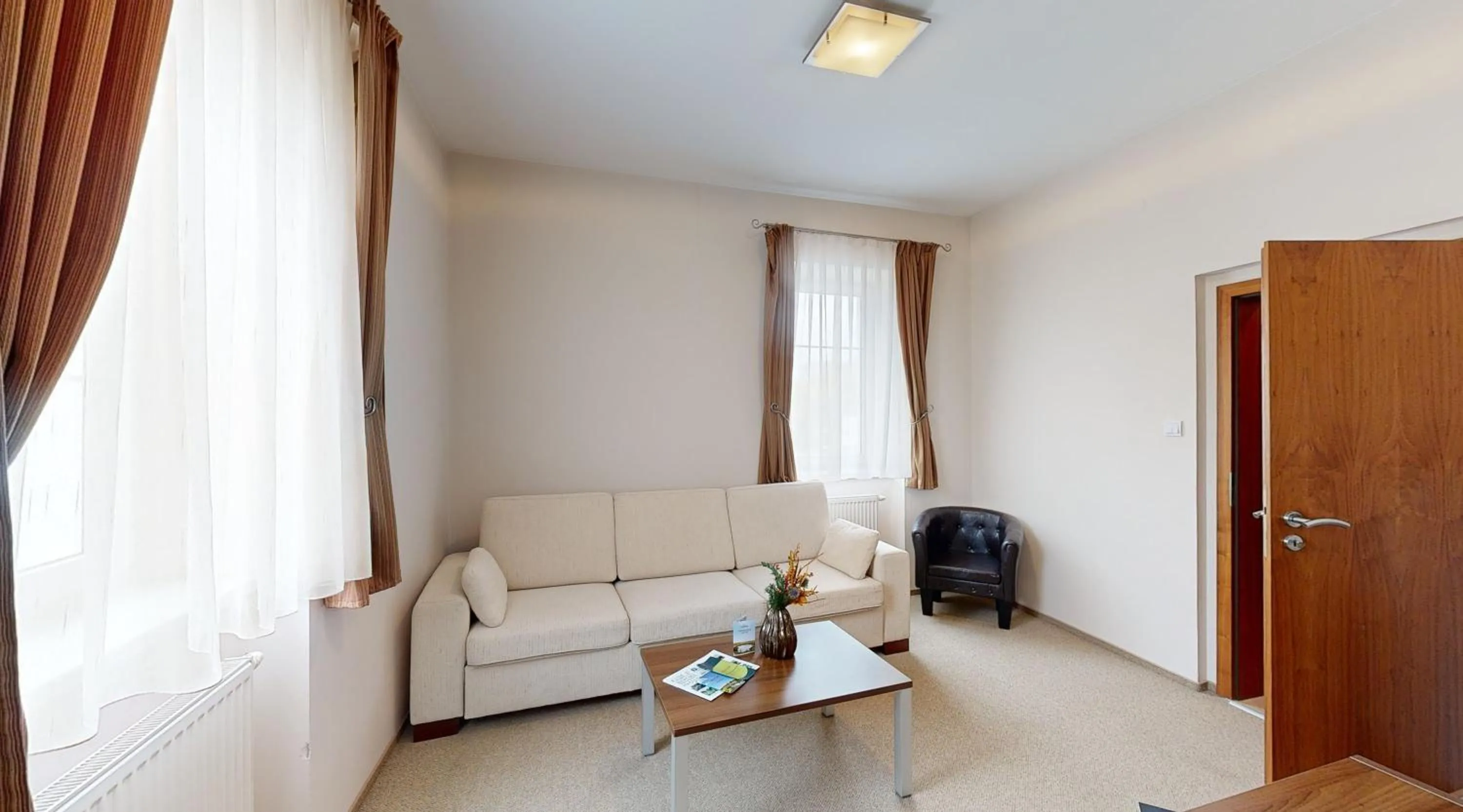 Seating area in Apex Hotel