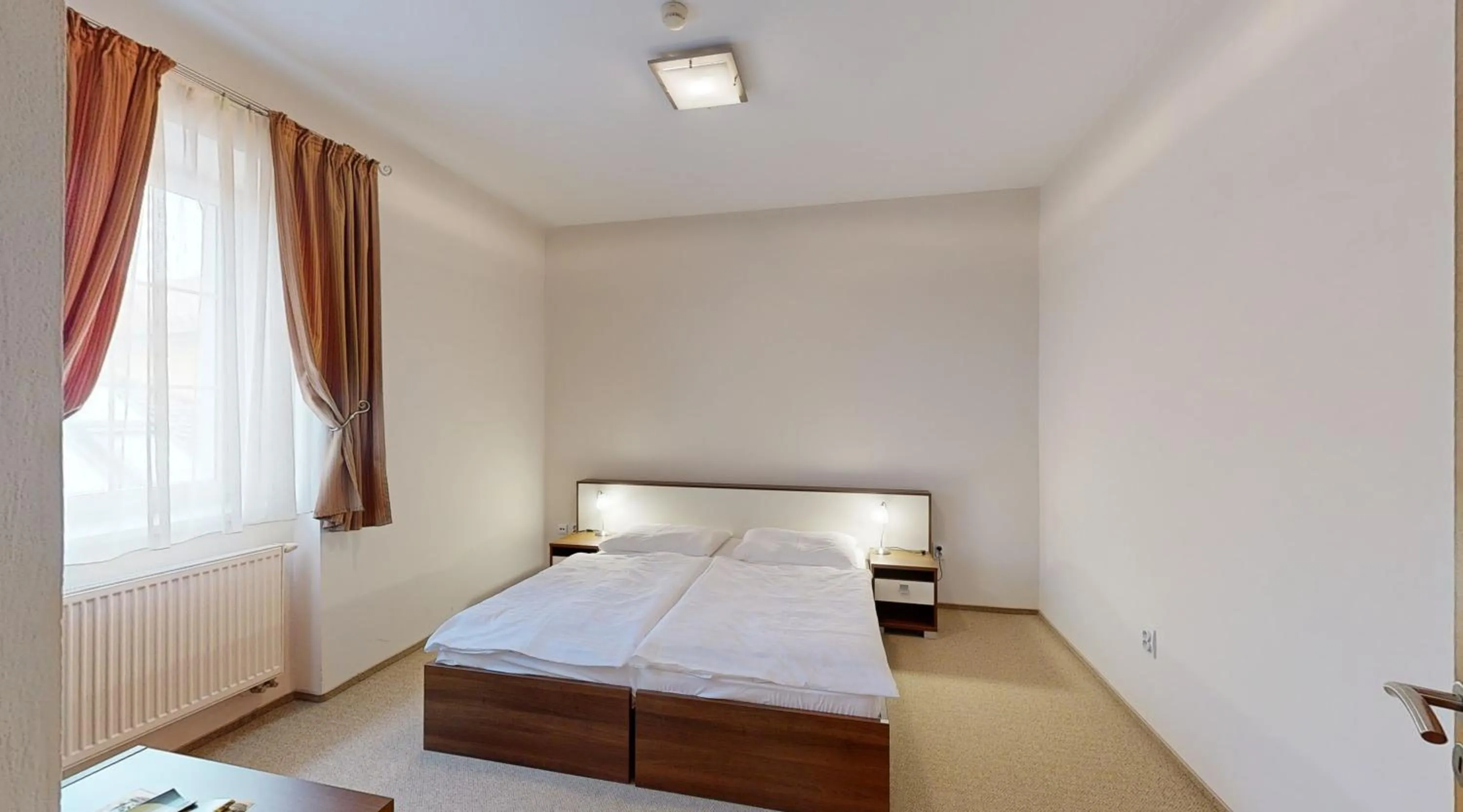 Bedroom in Apex Hotel