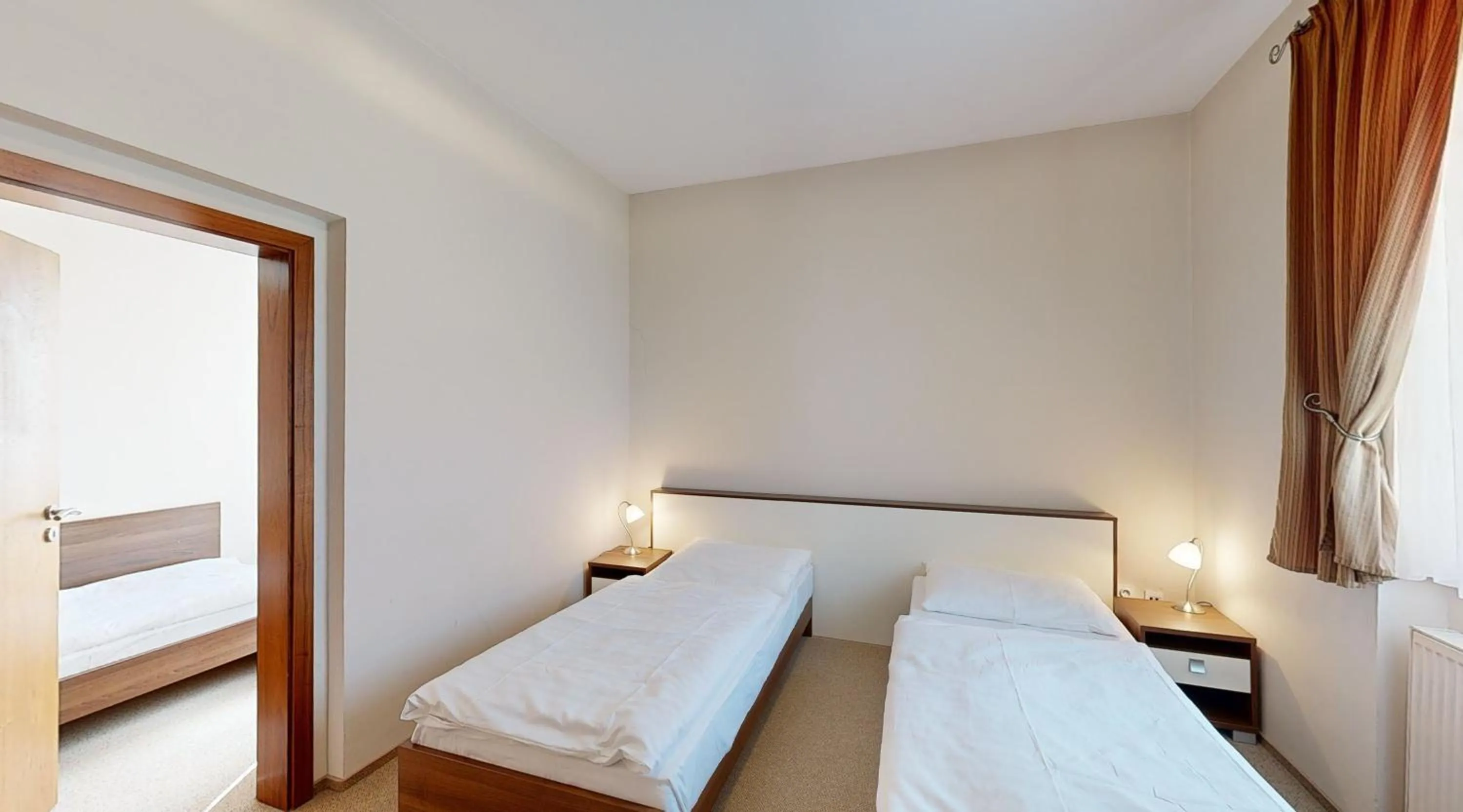 Bedroom in Apex Hotel