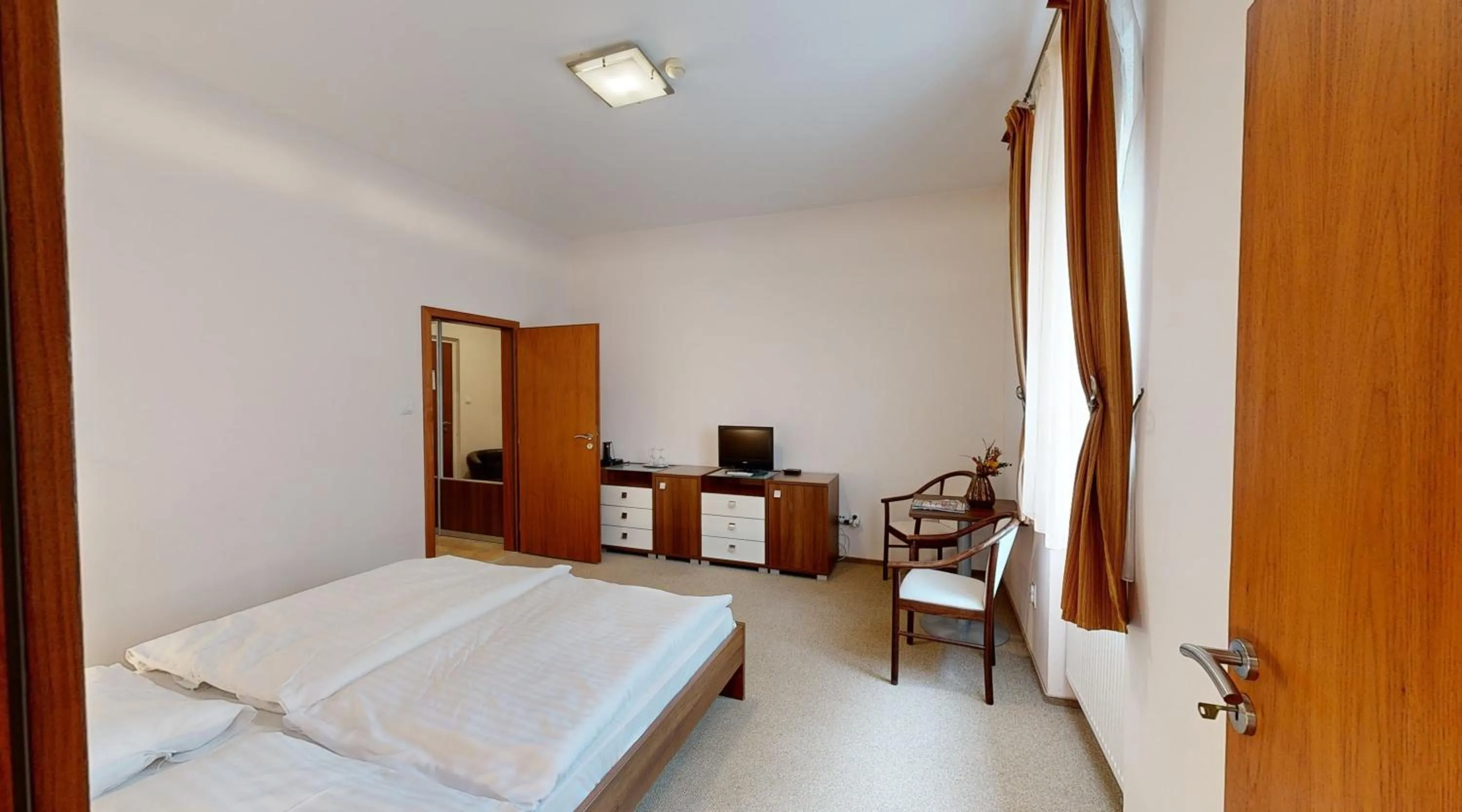 Bedroom in Apex Hotel