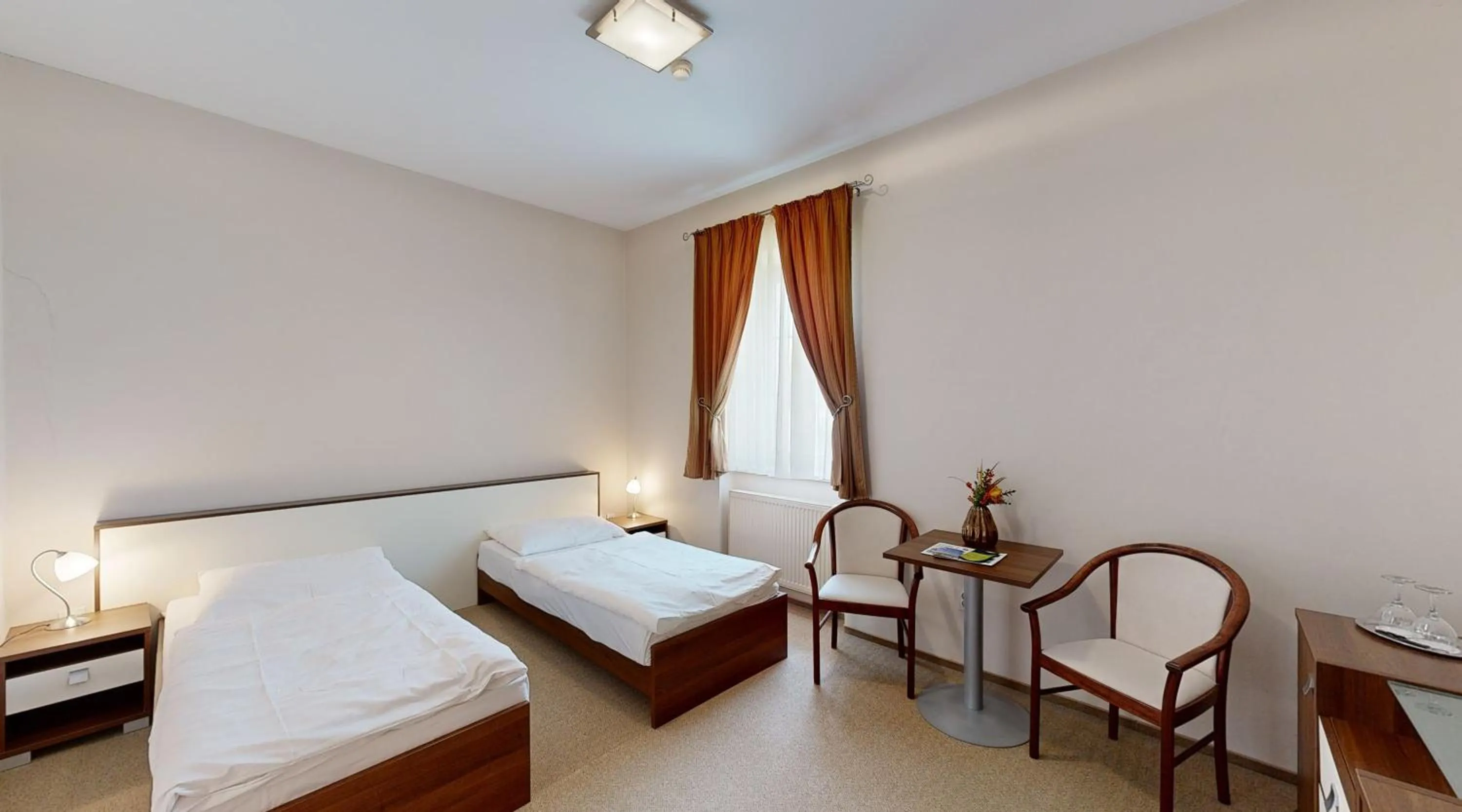 Bedroom in Apex Hotel