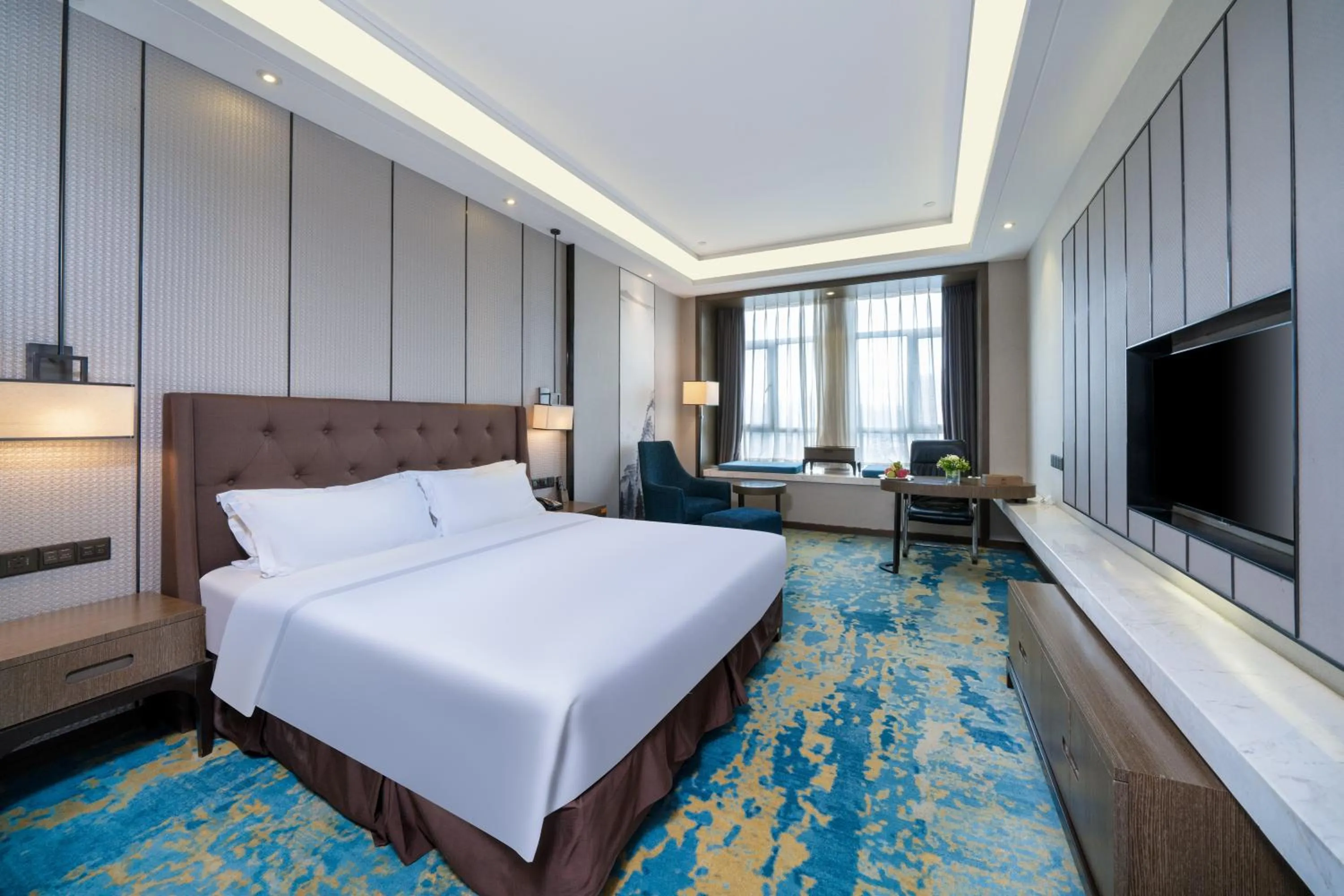 Bed in ME Yinhe International Hotel