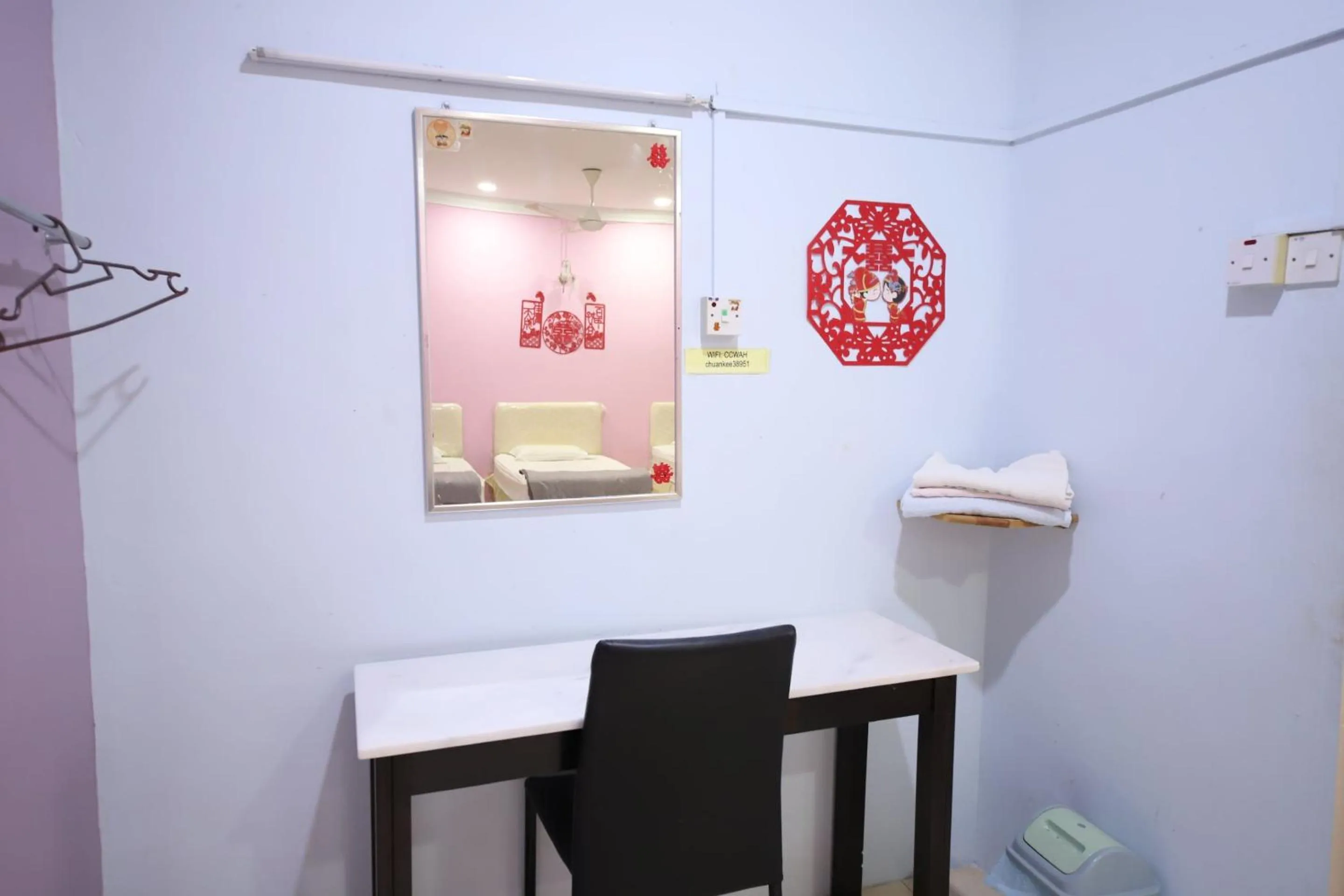 Bedroom in OYO Homes 90575 CK Bahau Homestay