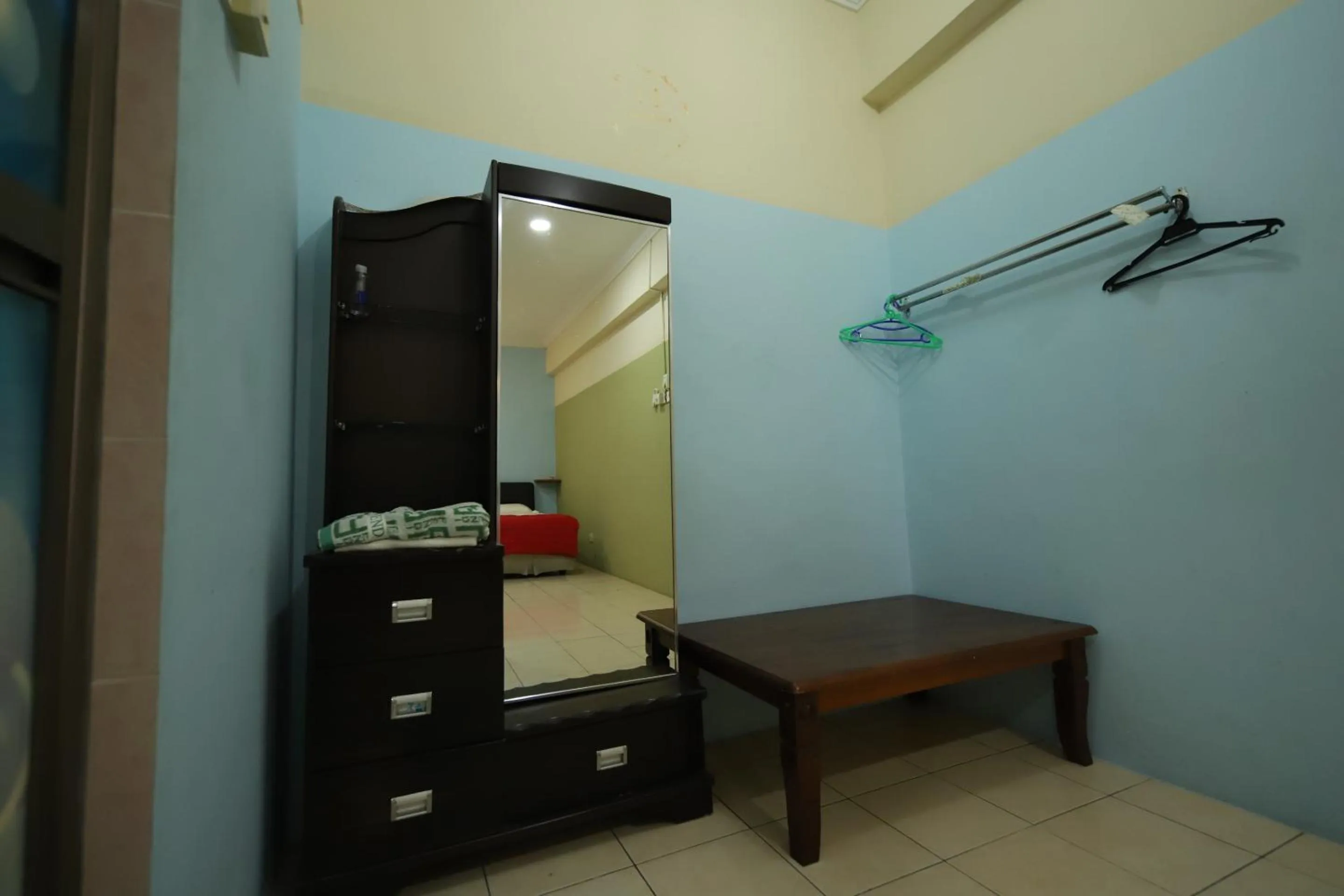 Bedroom in OYO Homes 90575 CK Bahau Homestay