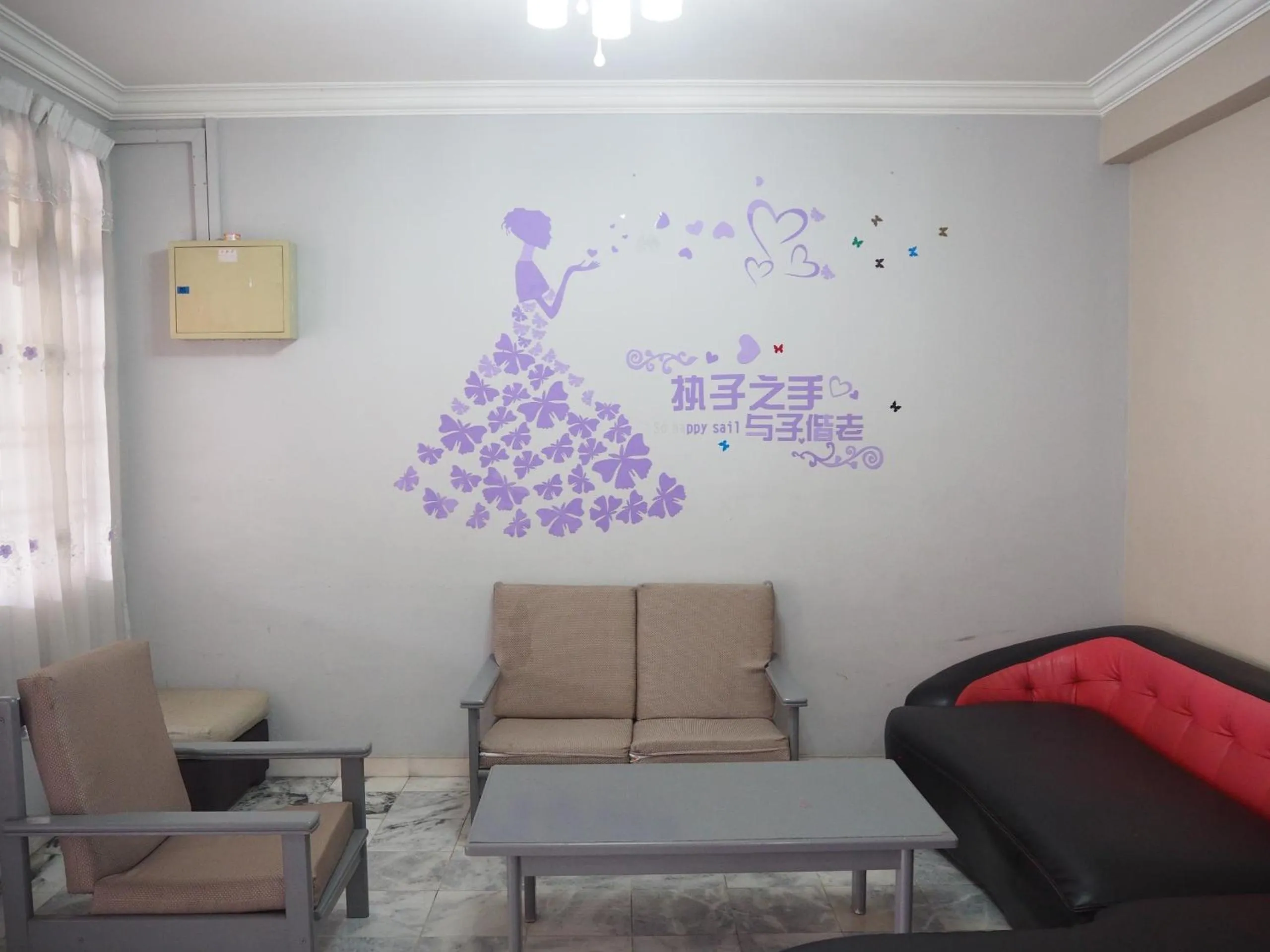 Living room in OYO Homes 90575 CK Bahau Homestay