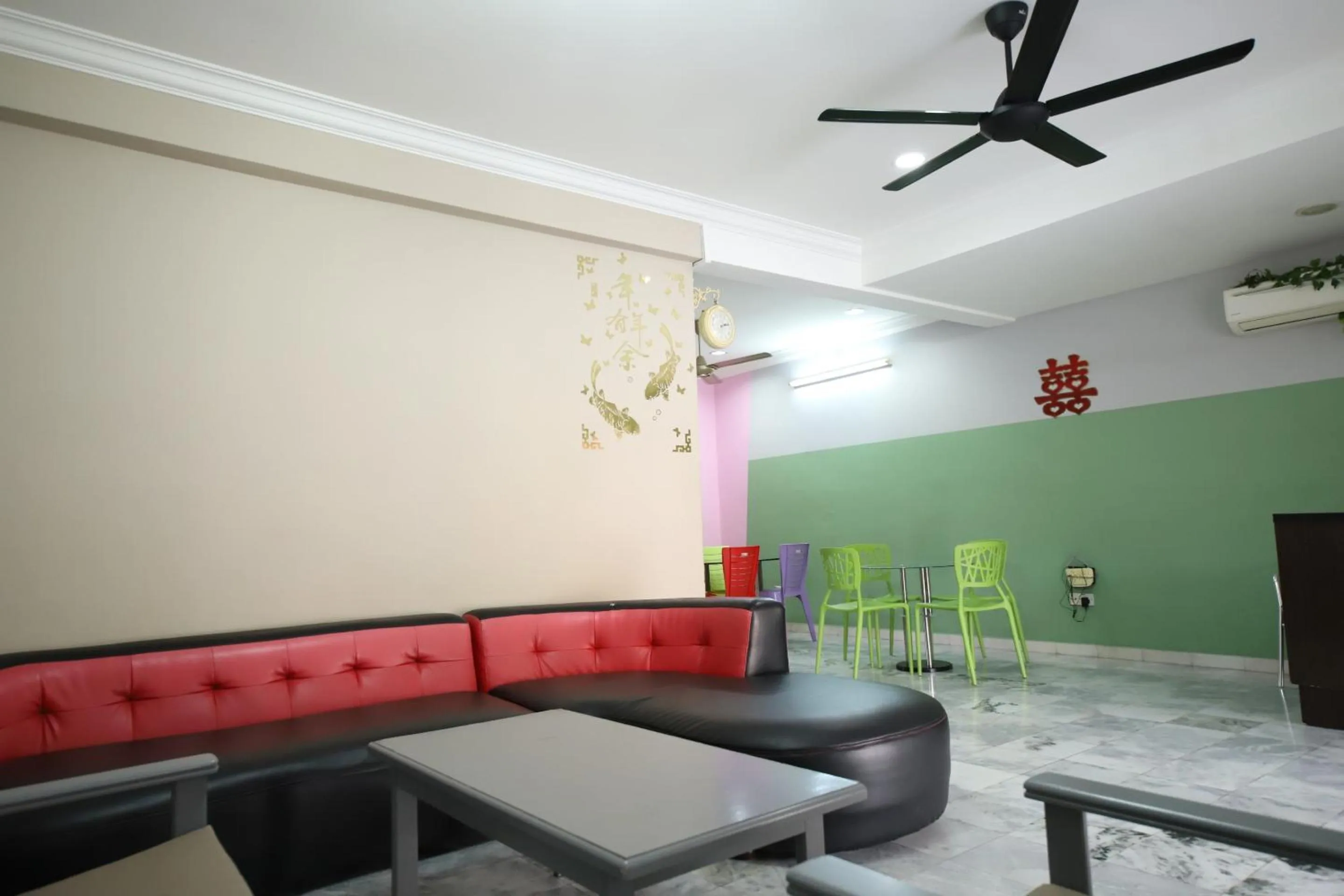 Living room in OYO Homes 90575 CK Bahau Homestay