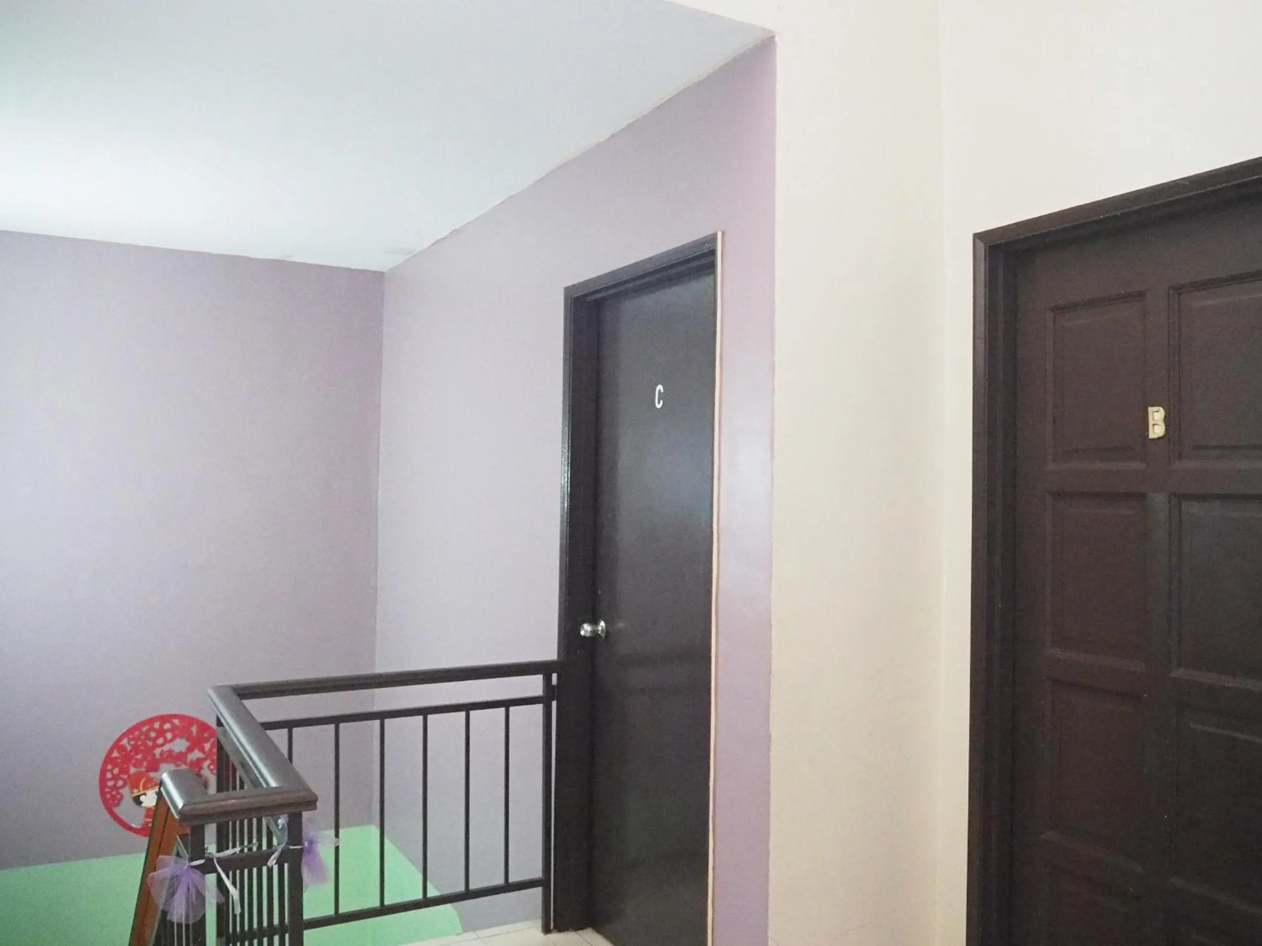 Bedroom in OYO Homes 90575 CK Bahau Homestay