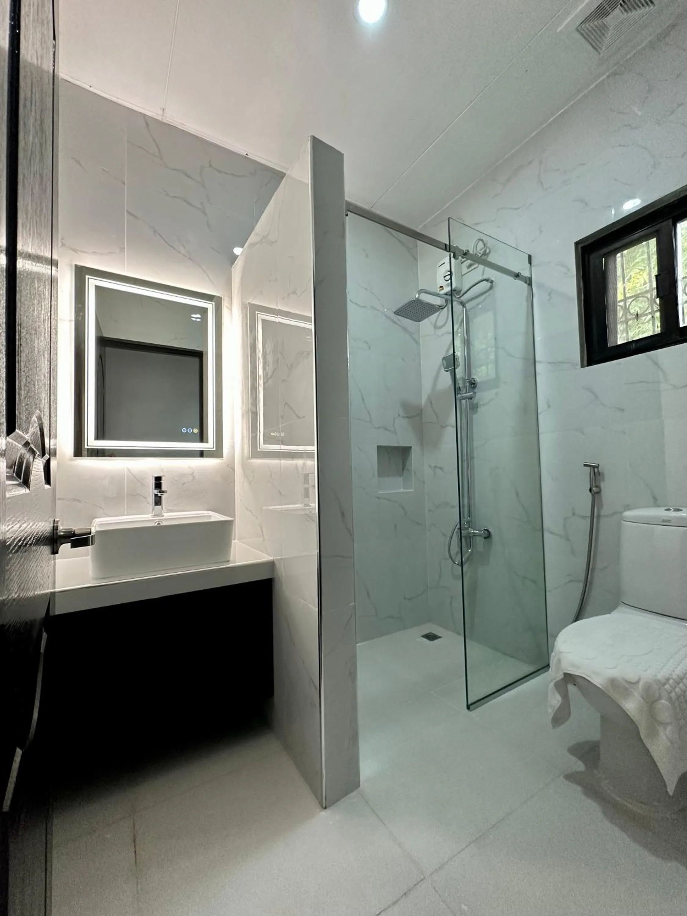 Shower in 3 Peaks Resort & Boutique Hotel