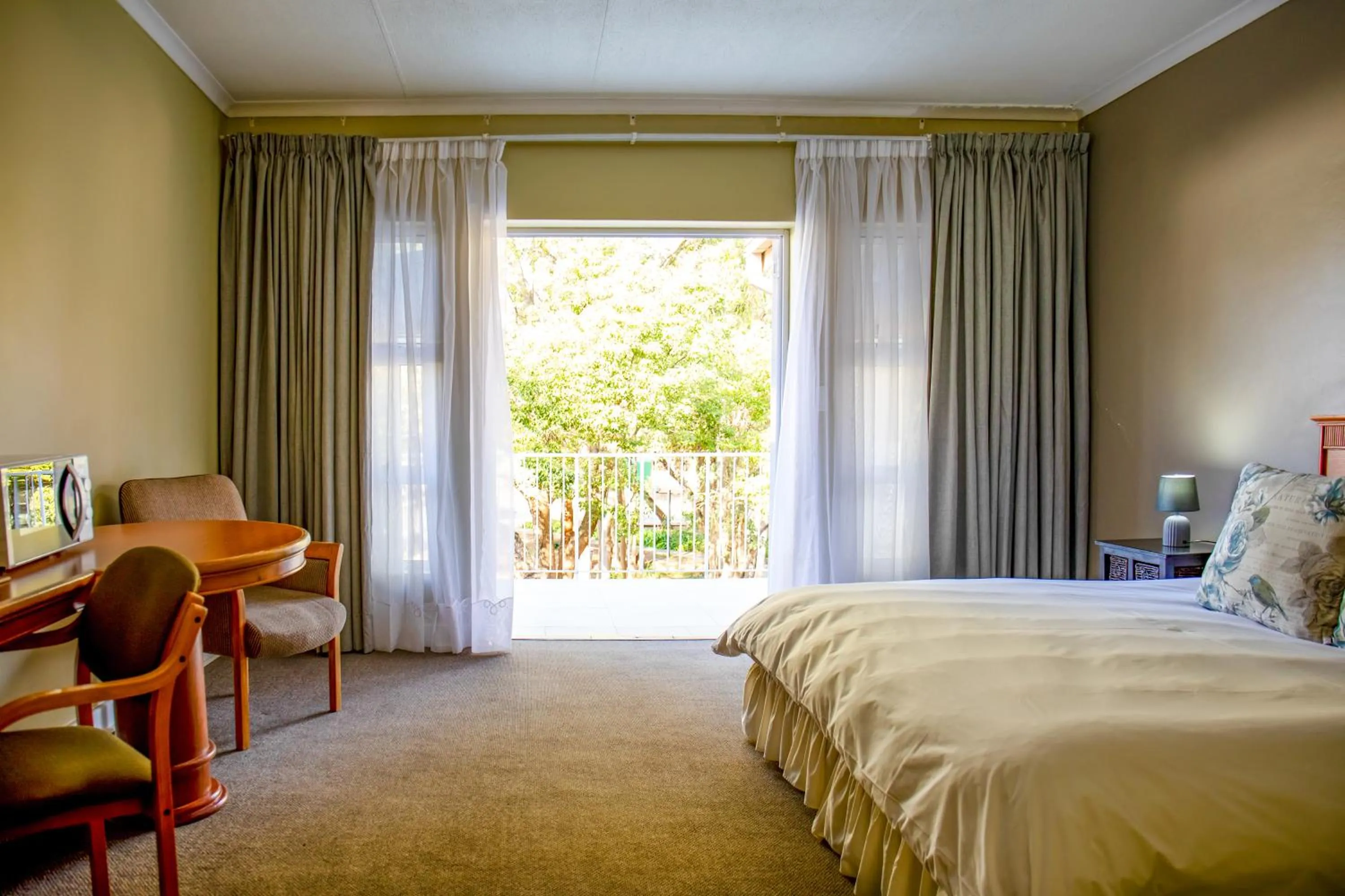 Balcony/Terrace, Bed in Acacia Guesthouse Klerksdorp