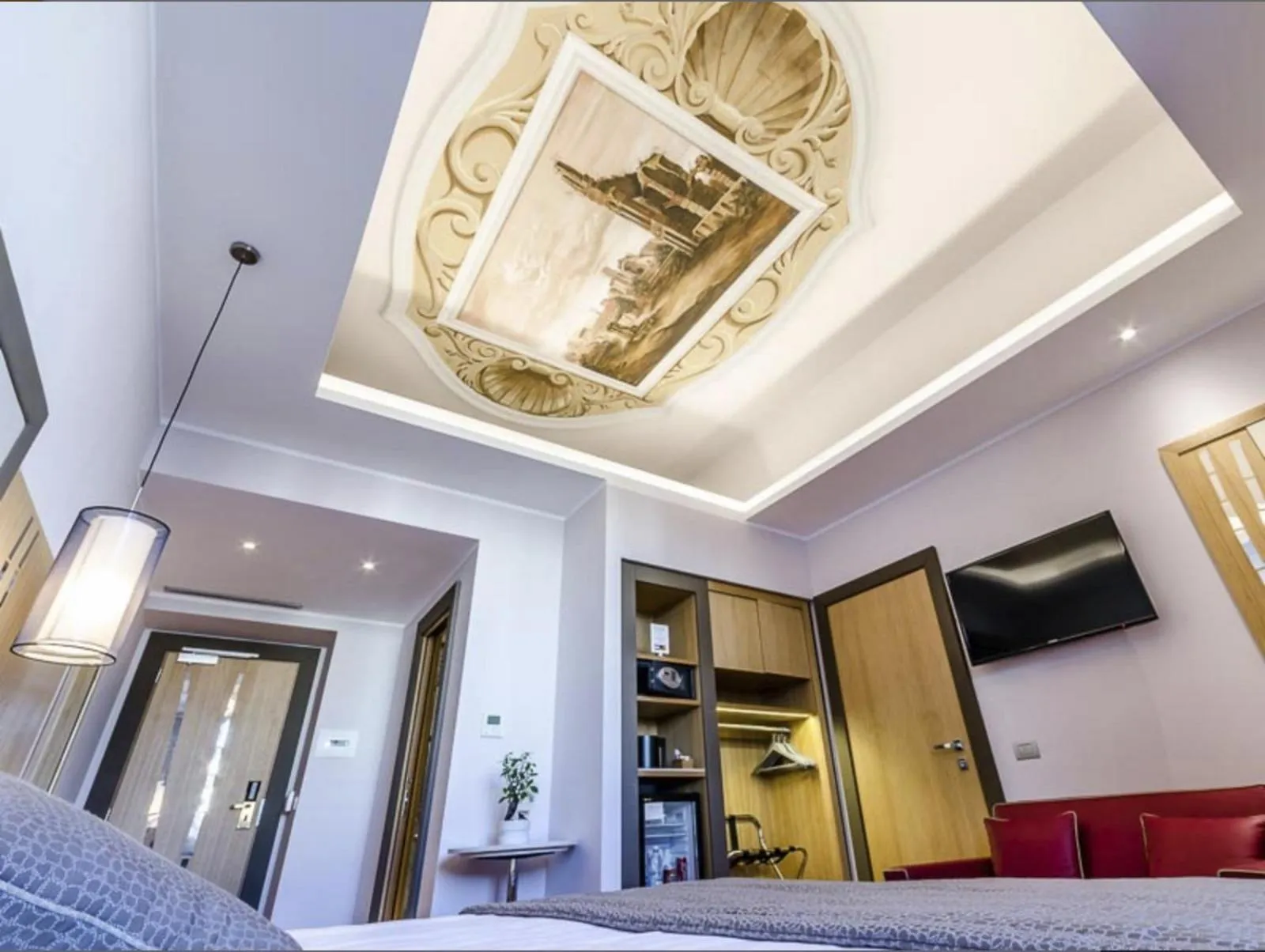 Decorative detail, Bed in Hotel Giolli Nazionale