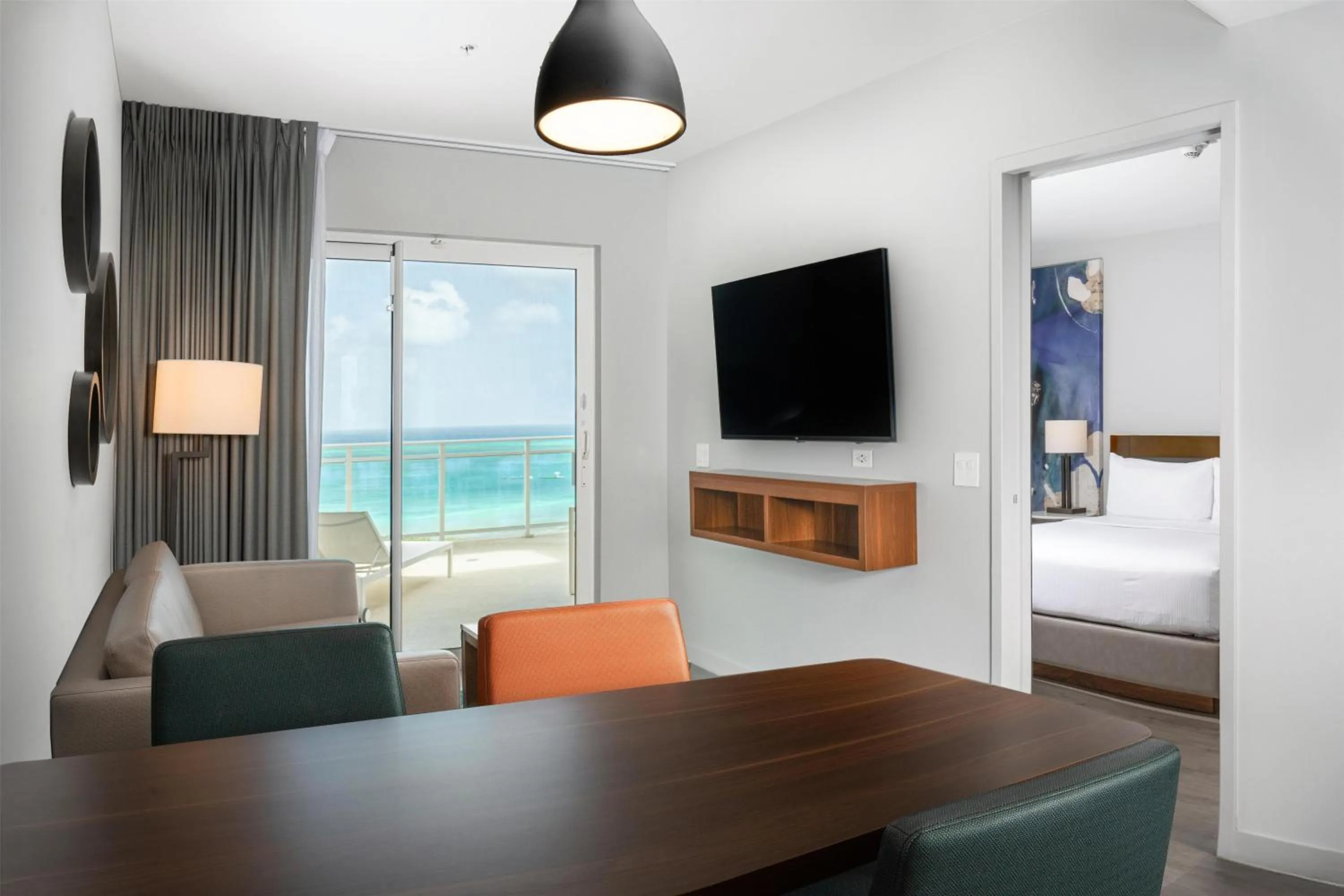Living room, Bed in Embassy Suites By Hilton Aruba Beach Resort