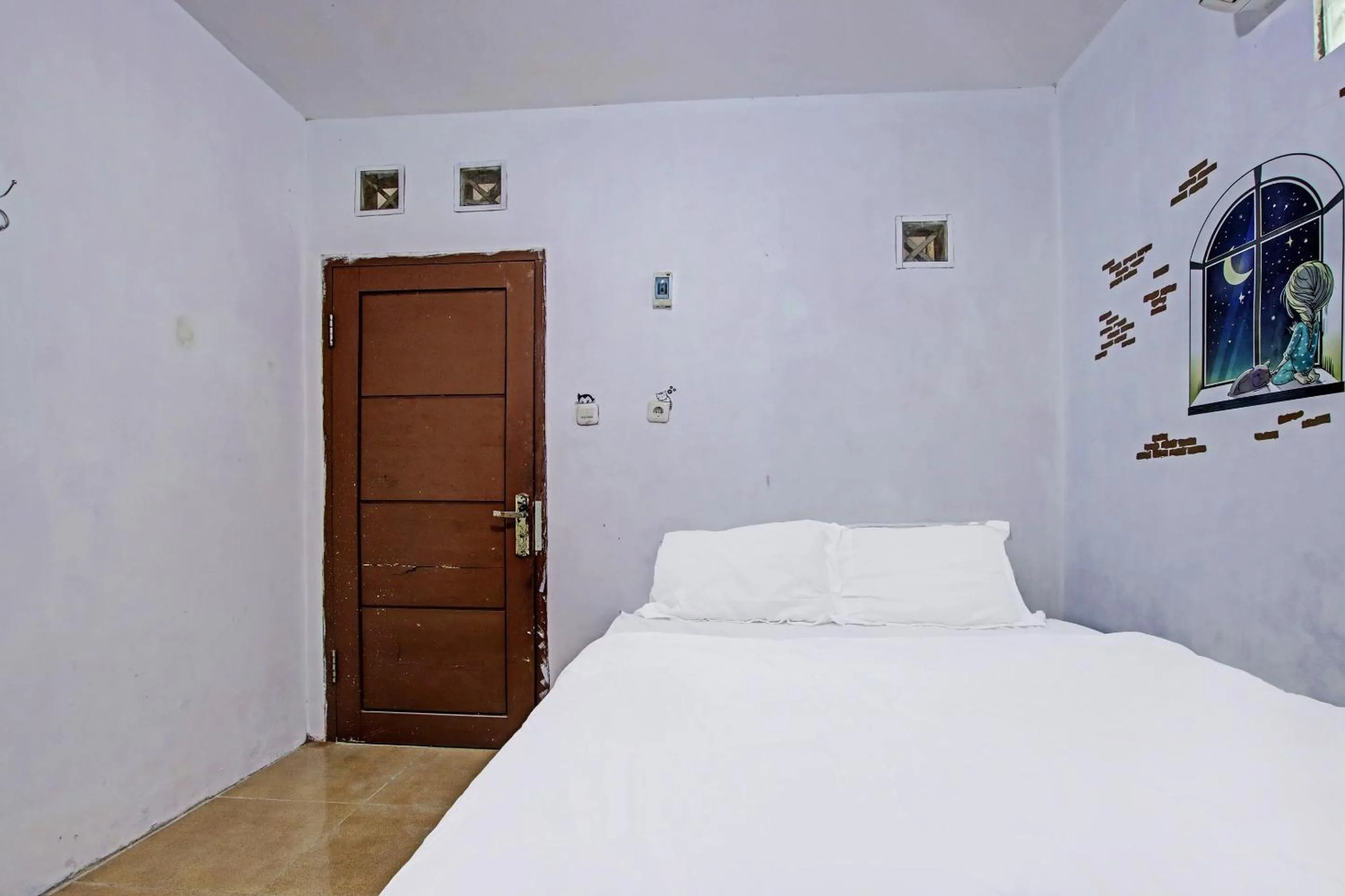 Bedroom in Hotel O Kedai Cinta Guest House