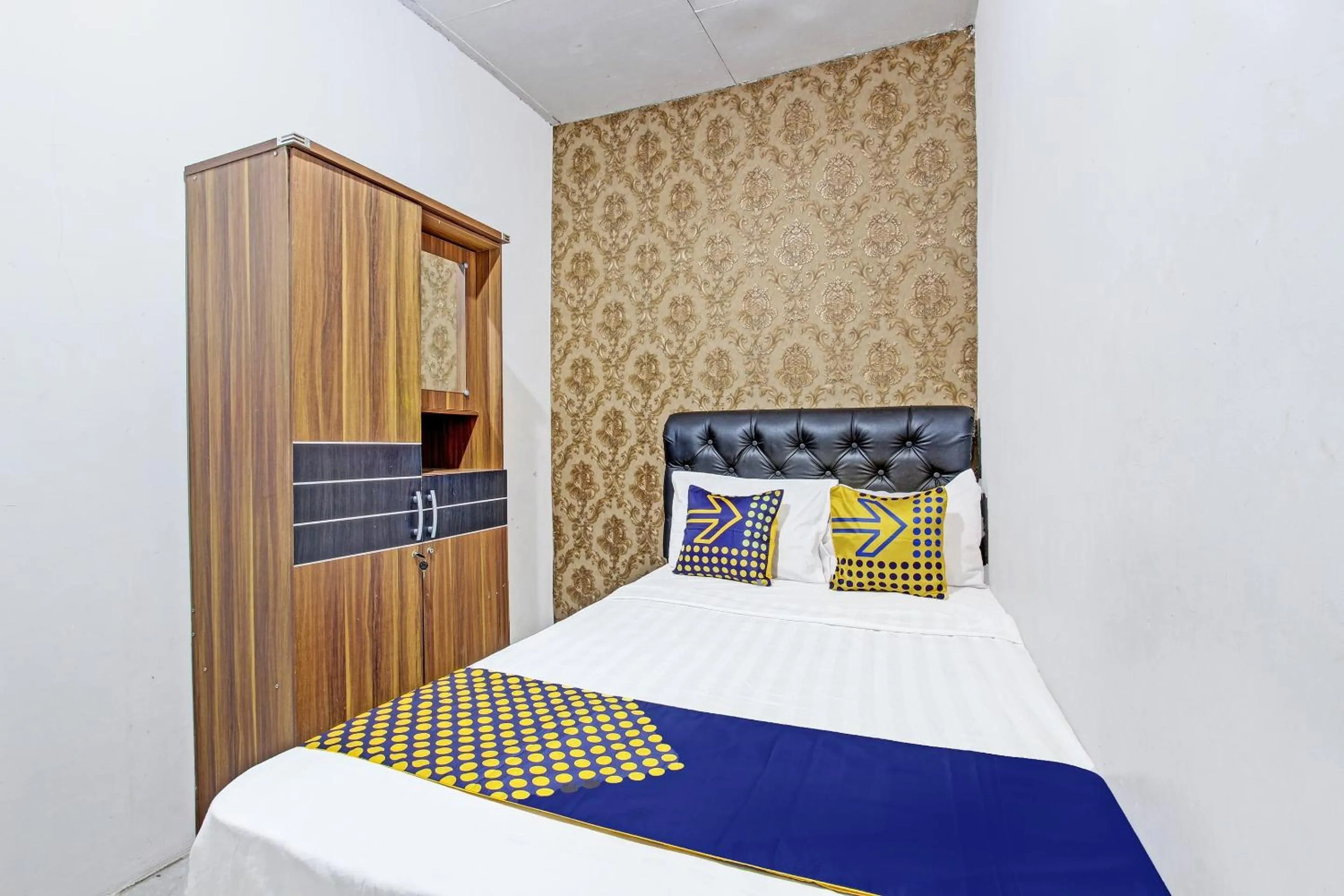 Bedroom, Bed in SPOT ON 91521 Mayong Guesthouse