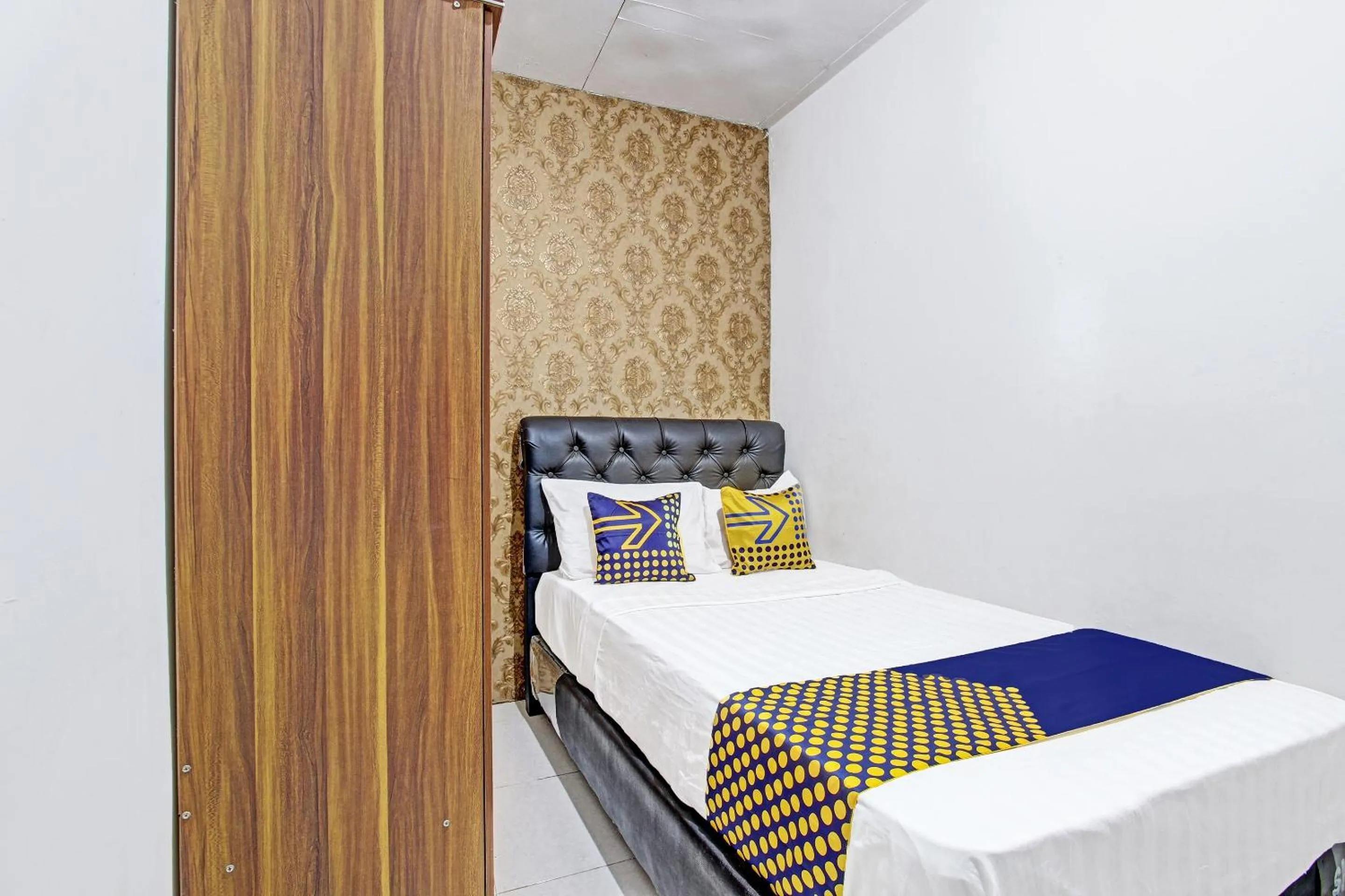 Bedroom, Bed in SPOT ON 91521 Mayong Guesthouse